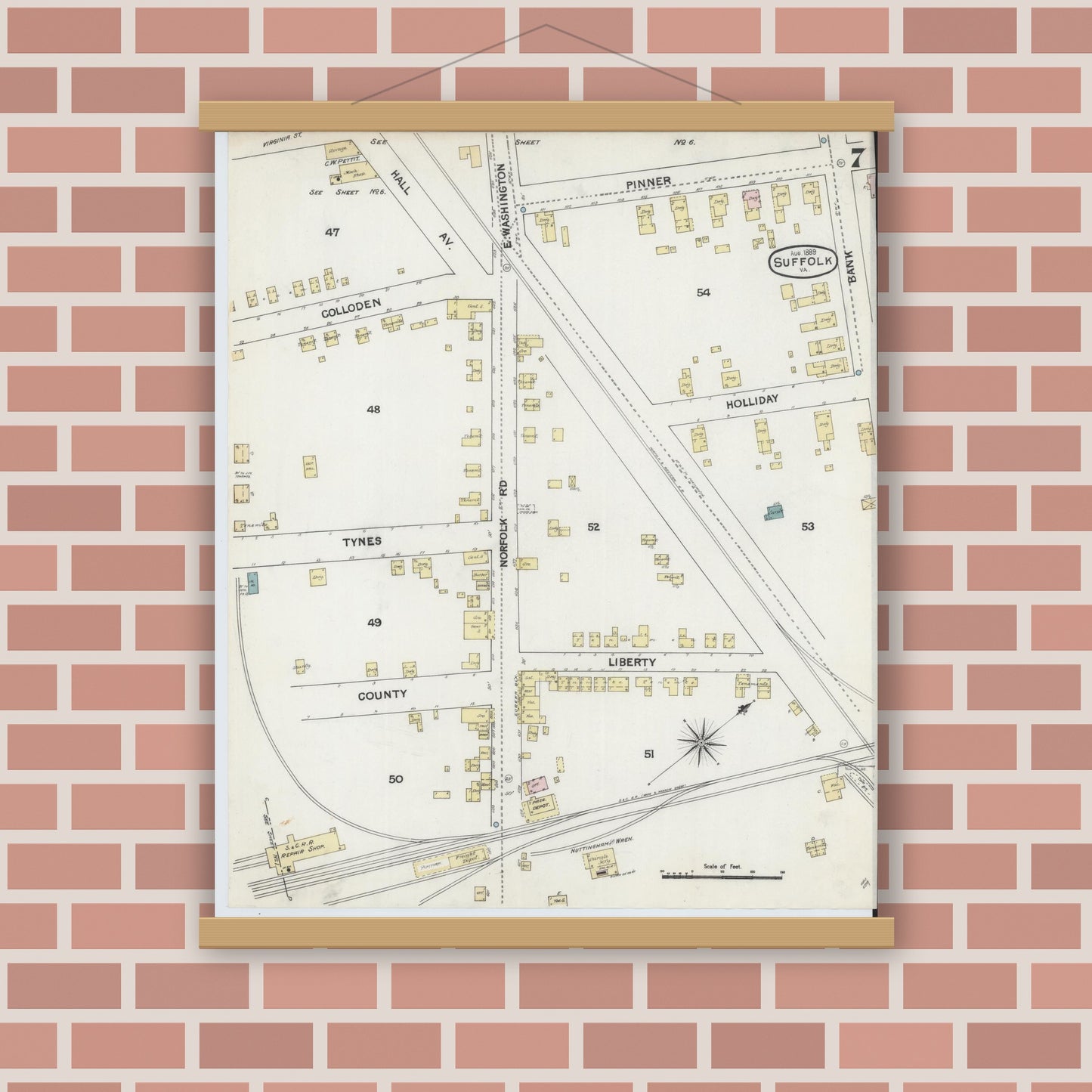 Old map wall art mockup — magnetic wood frame on brick wall — Sanborn Fire Insurance Map from Suffolk, Independent Cities, Virginia (1889), Sheet #0007