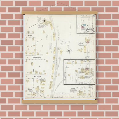 Old map wall art mockup — magnetic wood frame on brick wall — Sanborn Fire Insurance Map from Stanton, Montcalm County, Michigan (1887), Sheet #0003