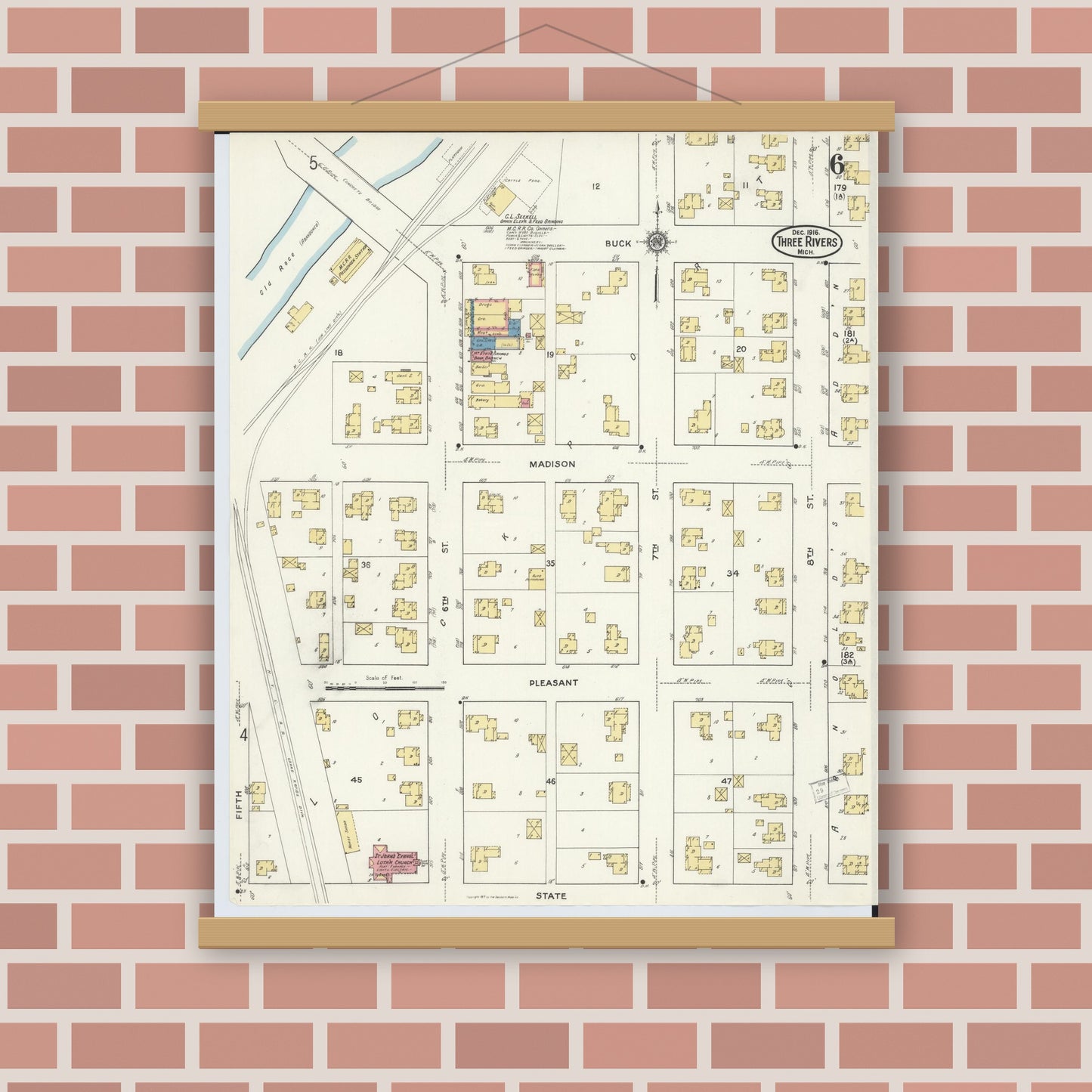 Old map wall art mockup — magnetic wood frame on brick wall — Sanborn Fire Insurance Map from Three Rivers, Saint Joseph County, Michigan (1916), Sheet #0006