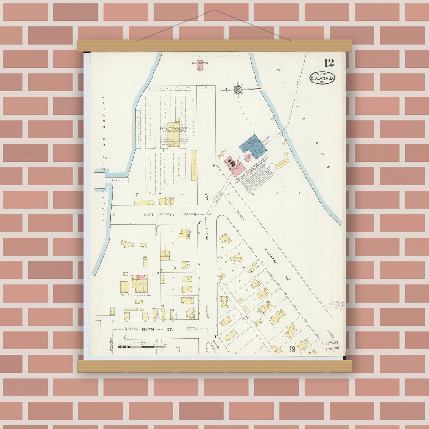 Old map wall art mockup — magnetic wood frame on brick wall — Sanborn Fire Insurance Map from Escanaba, Delta County, Michigan (1913), Sheet #0012