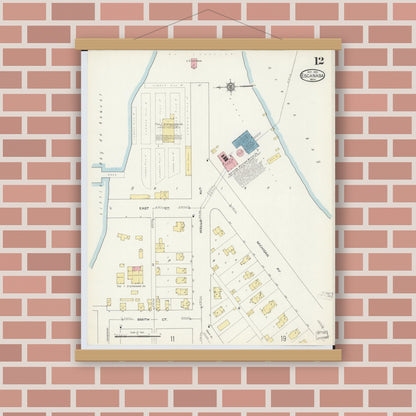 Old map wall art mockup — magnetic wood frame on brick wall — Sanborn Fire Insurance Map from Escanaba, Delta County, Michigan (1913), Sheet #0012