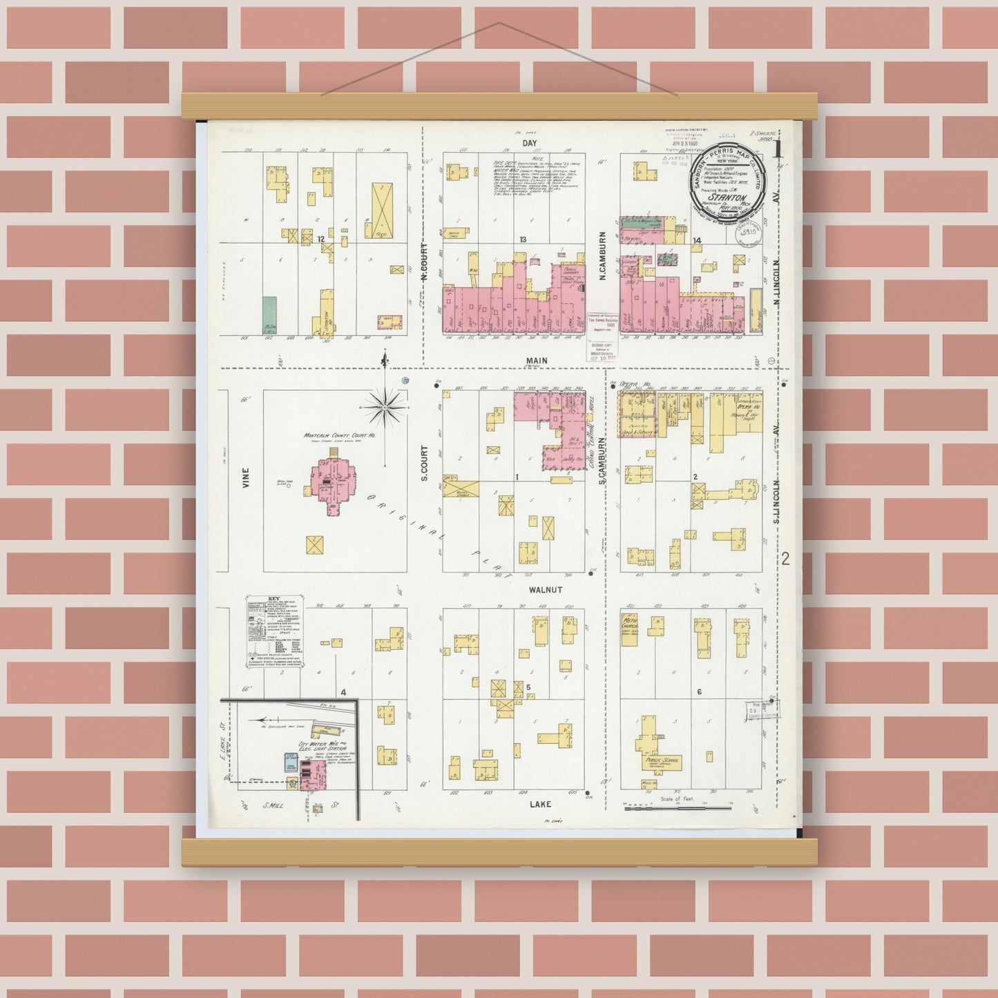 Old map wall art mockup — magnetic wood frame on brick wall — Sanborn Fire Insurance Map from Stanton, Montcalm County, Michigan (1900) - Complete Map Set