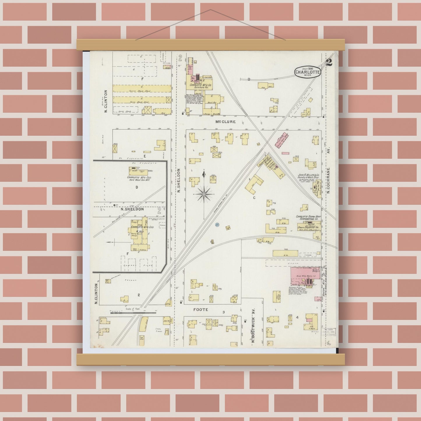 Old map wall art mockup — magnetic wood frame on brick wall — Sanborn Fire Insurance Map from Charlotte, Eaton County, Michigan (1895), Sheet #0002