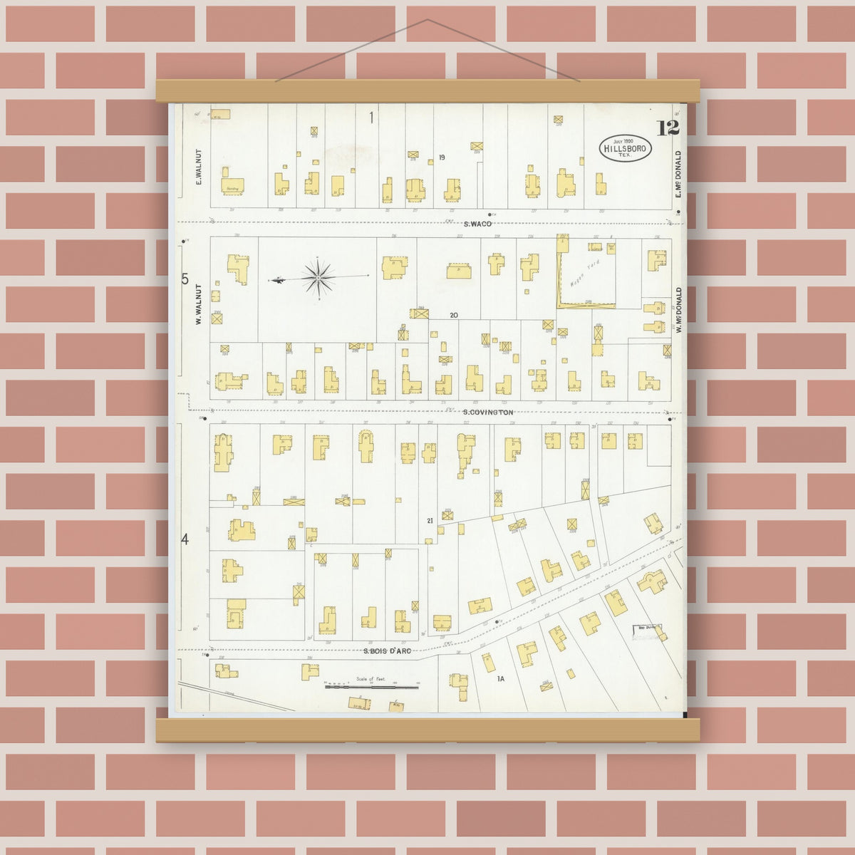 Old map wall art mockup — magnetic wood frame on brick wall — Sanborn Fire Insurance Map from Hillsboro, Hill County, Texas (1900), Sheet #0012
