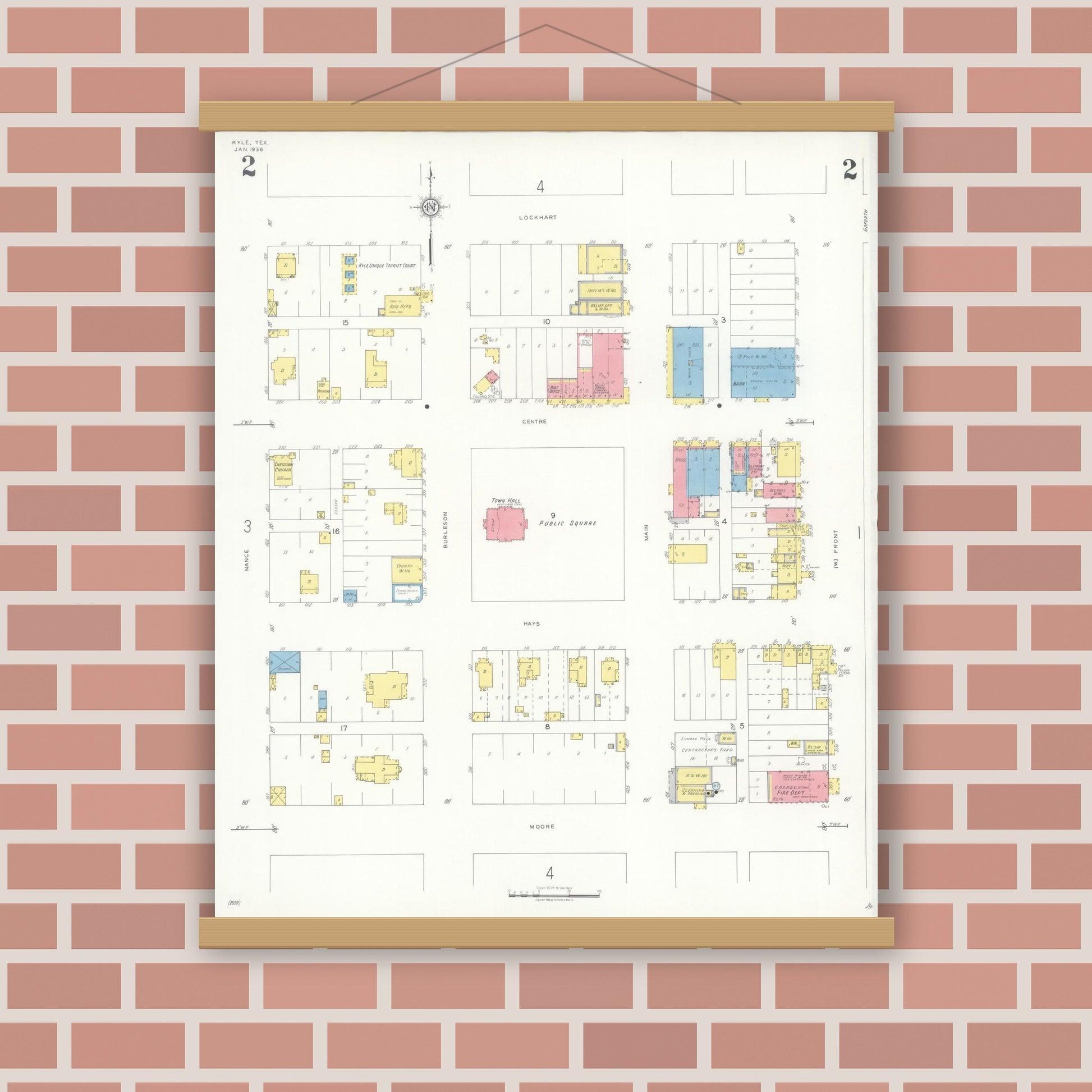 Old map wall art mockup — magnetic wood frame on brick wall — Sanborn Fire Insurance Map from Kyle, Hays County, Texas (1936), Sheet #0002