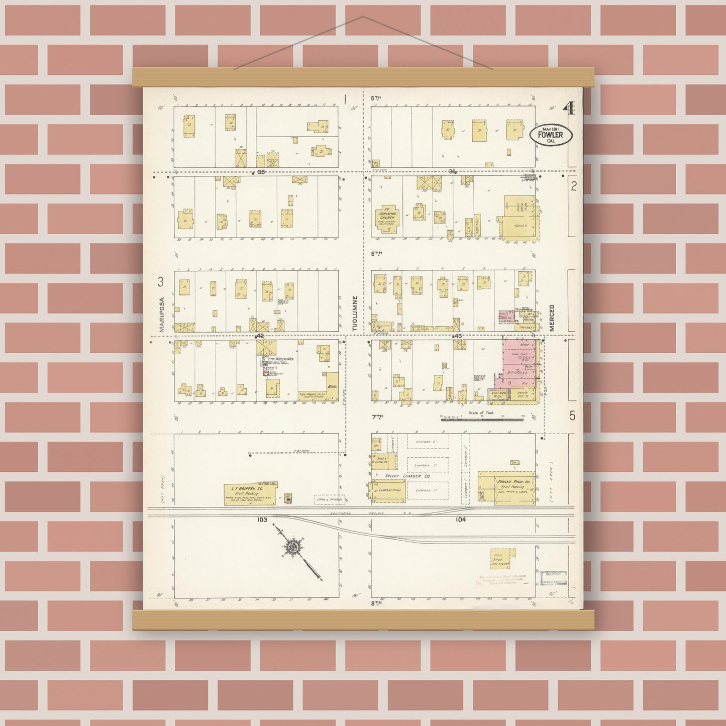 Old map wall art mockup — magnetic wood frame on brick wall — Sanborn Fire Insurance Map from Fowler, Fresno County, California (1911), Sheet #0004