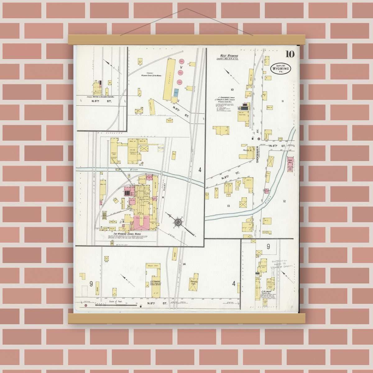 Old map wall art mockup — magnetic wood frame on brick wall — Sanborn Fire Insurance Map from Wyoming, Luzerne County, Pennsylvania (1911), Sheet #0010