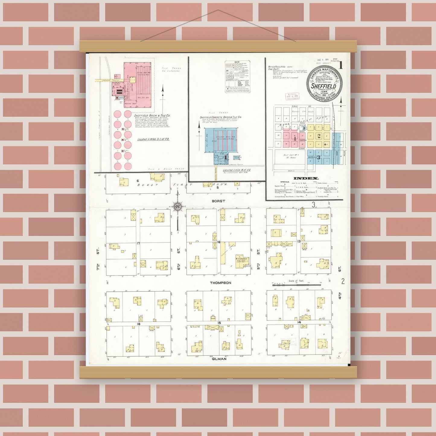Old map wall art mockup — magnetic wood frame on brick wall — Sanborn Fire Insurance Map from Sheffield, Franklin County, Iowa (1911), Sheet #0001