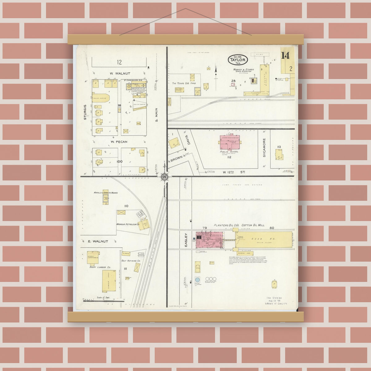 Old map wall art mockup — magnetic wood frame on brick wall — Sanborn Fire Insurance Map from Taylor, Williamson County, Texas (1916), Sheet #0014