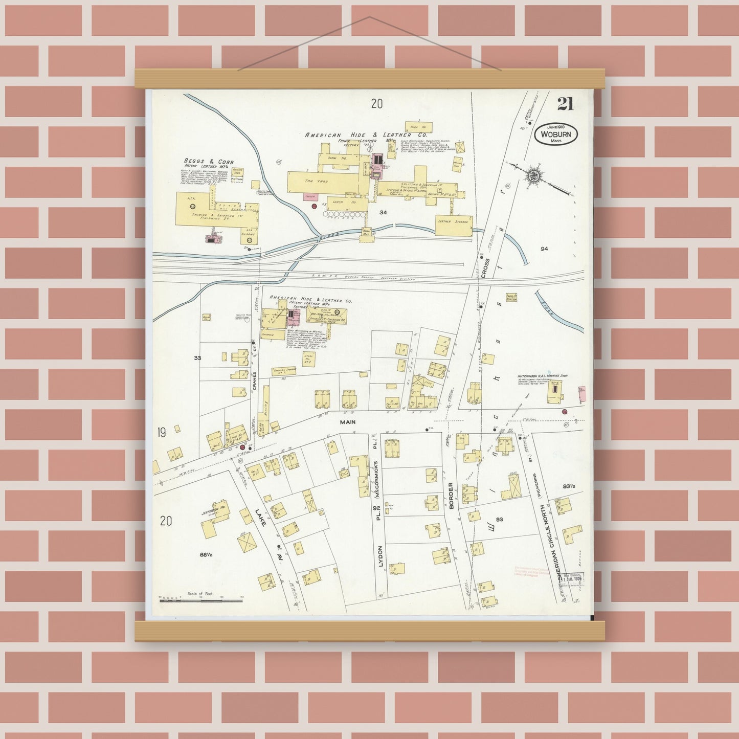 Old map wall art mockup — magnetic wood frame on brick wall — Sanborn Fire Insurance Map from Woburn, Middlesex County, Massachusetts (1910), Sheet #0021