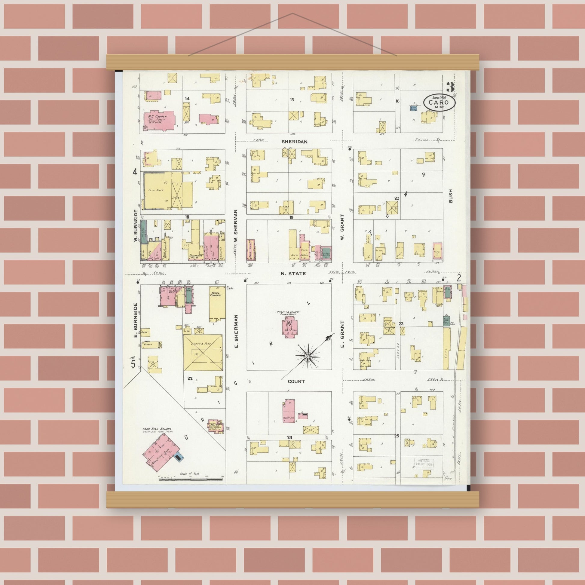 Old map wall art mockup — magnetic wood frame on brick wall — Sanborn Fire Insurance Map from Caro, Tuscola County, Michigan (1909), Sheet #0003