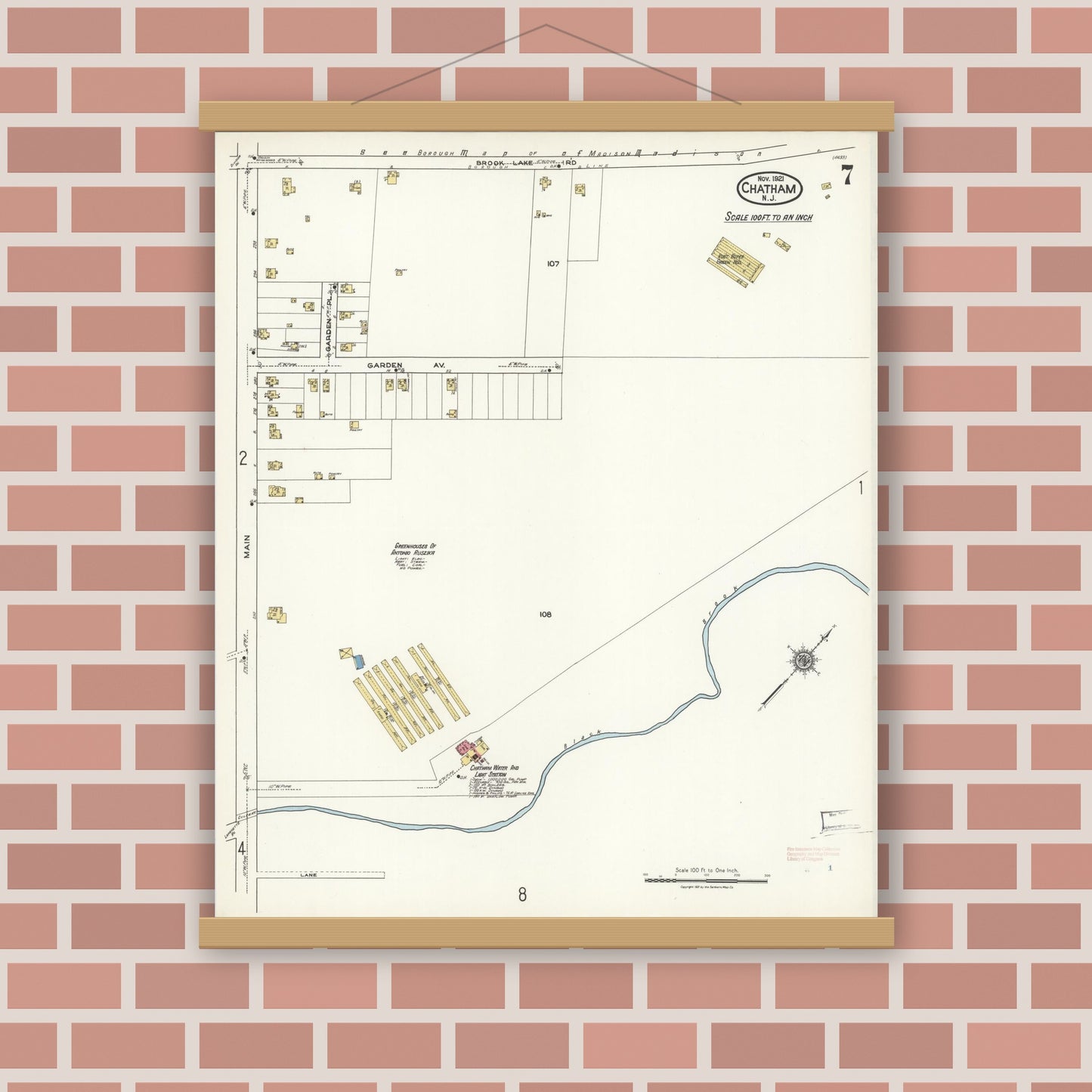 Old map wall art mockup — magnetic wood frame on brick wall — Sanborn Fire Insurance Map from Chatham, Morris County, New Jersey (1921), Sheet #0007