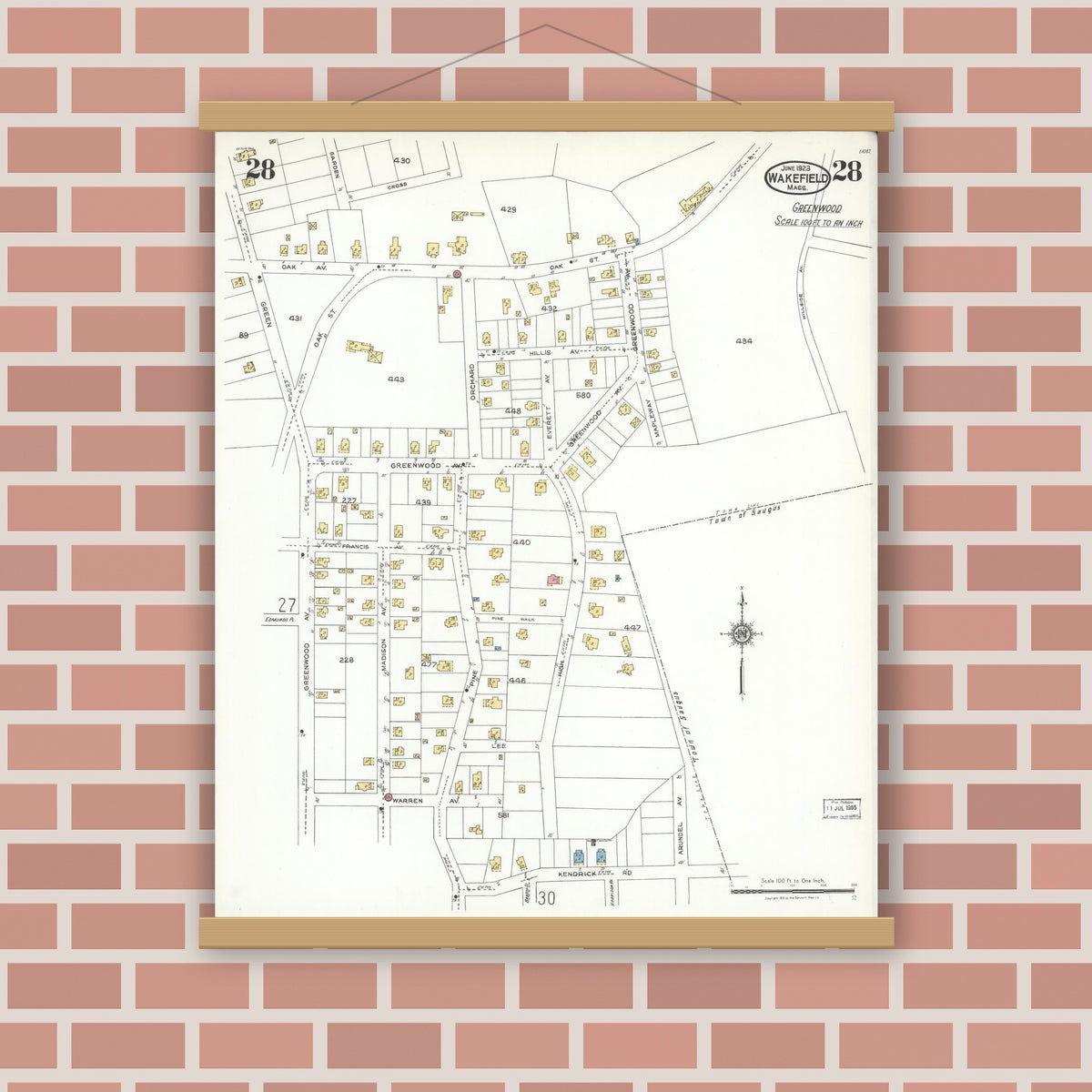 Old map wall art mockup — magnetic wood frame on brick wall — Sanborn Fire Insurance Map from Wakefield, Middlesex County, Massachusetts (1923), Sheet #0028