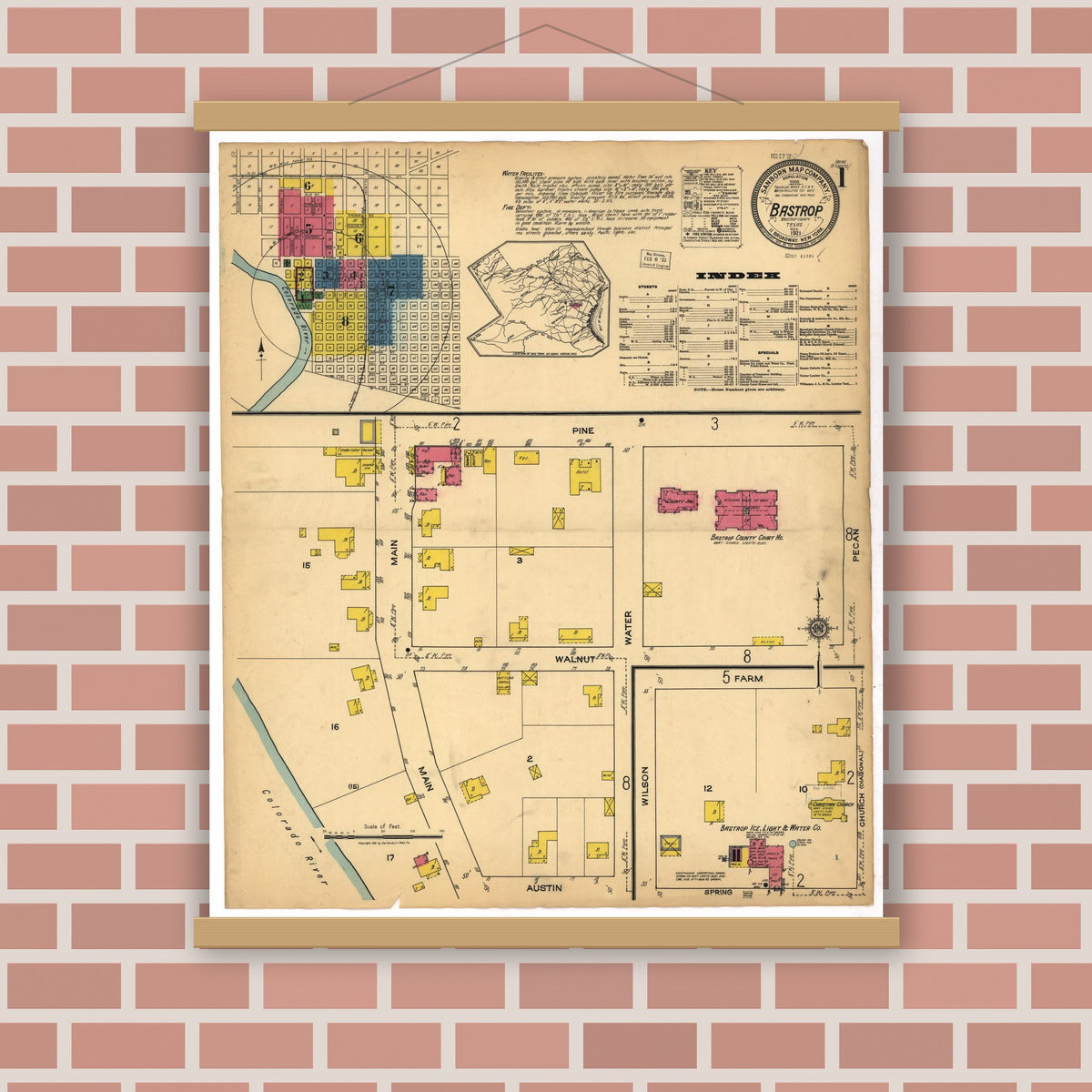 Old map wall art mockup — magnetic wood frame on brick wall — Sanborn Fire Insurance Map from Bastrop, Bastrop County, Texas (1921), Sheet #0001
