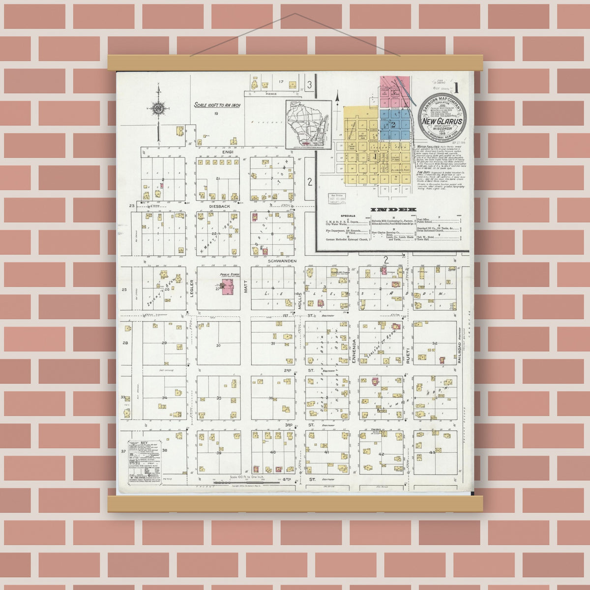 Old map wall art mockup — magnetic wood frame on brick wall — Sanborn Fire Insurance Map from New Glarus, Green County, Wisconsin (1919) - Complete Map Set