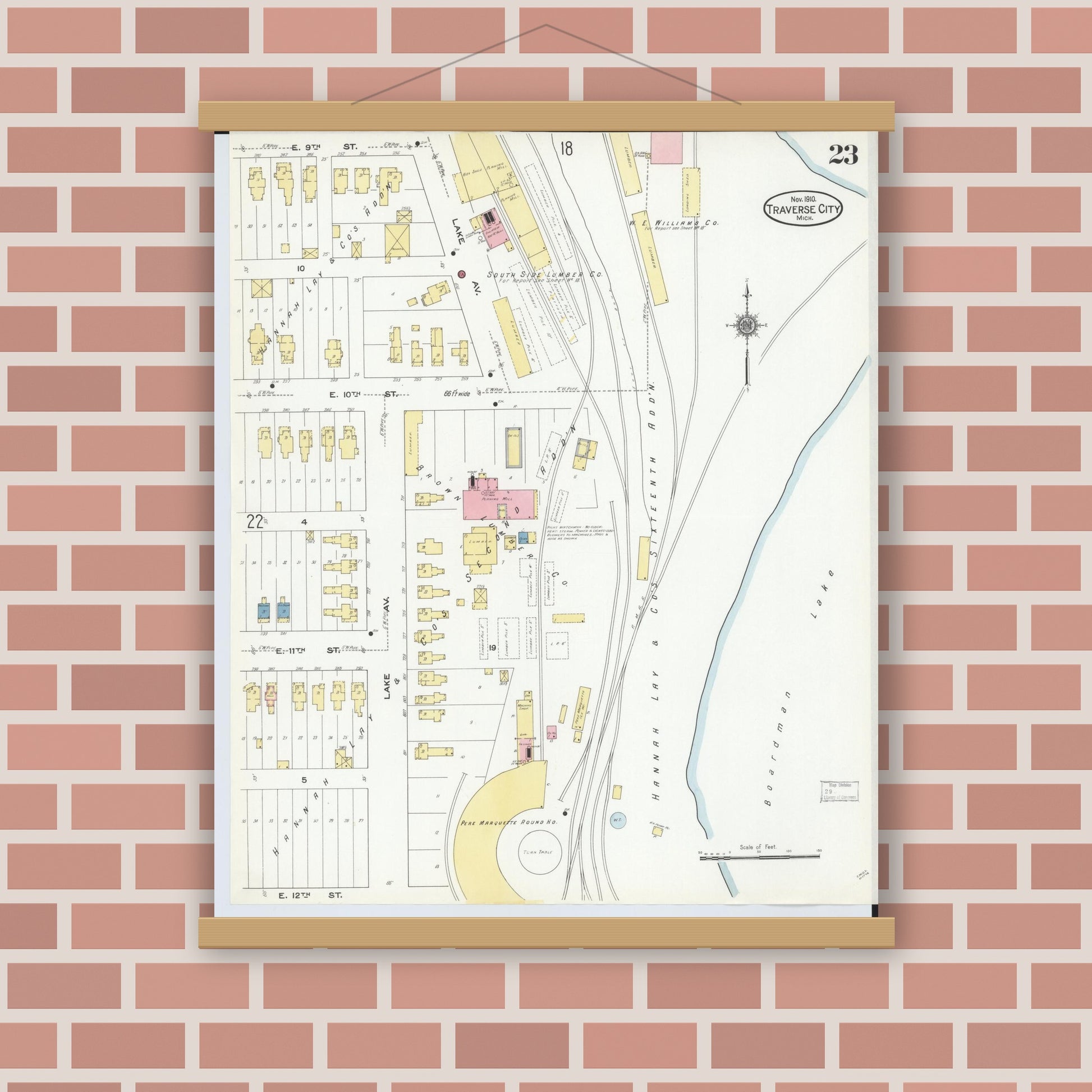 Old map wall art mockup — magnetic wood frame on brick wall — Sanborn Fire Insurance Map from Traverse City, Grand Traverse County, Michigan (1910), Sheet #0023