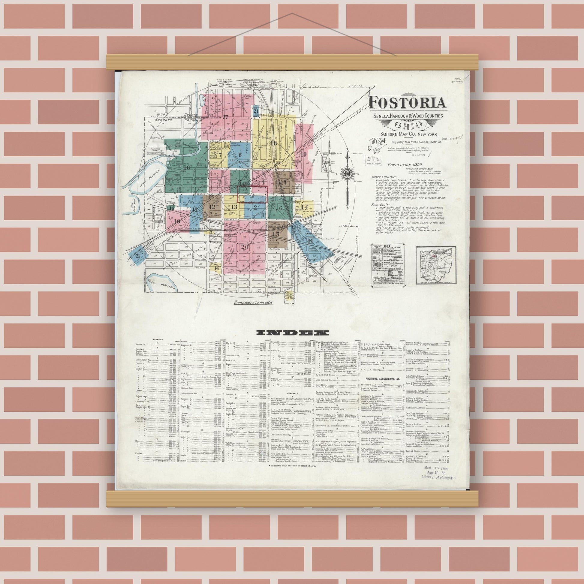 Old map wall art mockup — magnetic wood frame on brick wall — Sanborn Fire Insurance Map from Fostoria, Seneca, Hancock, And Wood Counties, Ohio (1924), Sheet #0001