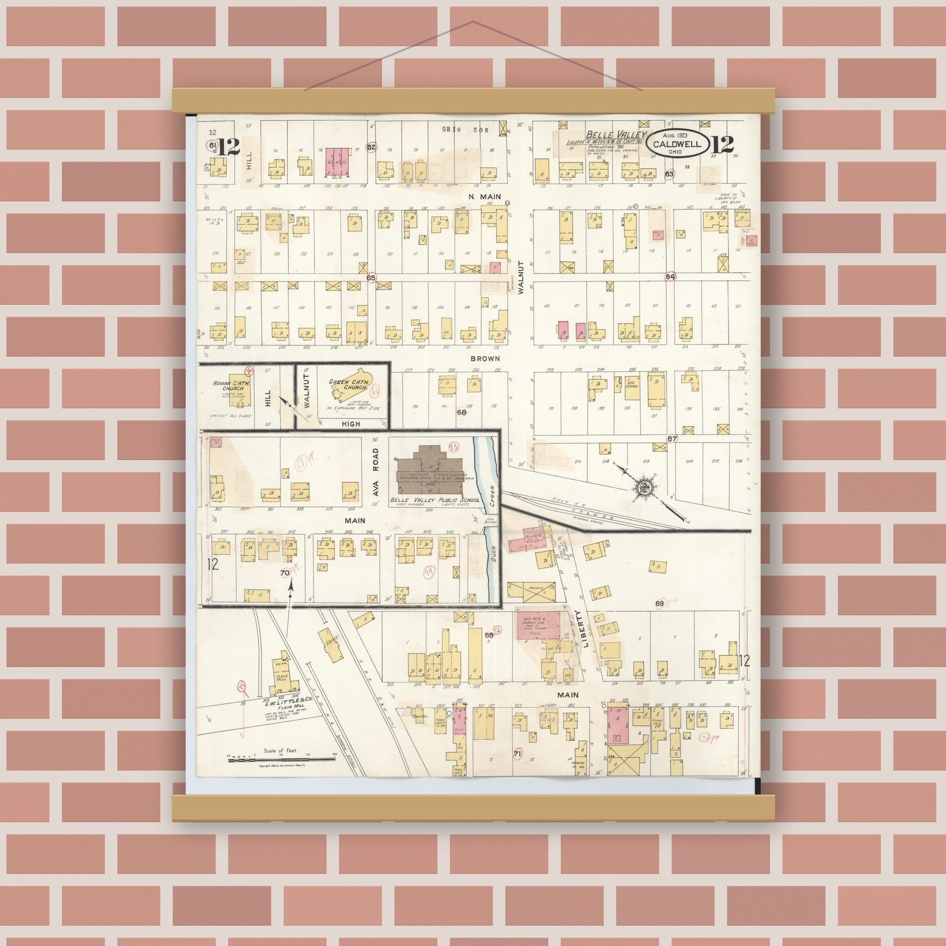 Old map wall art mockup — magnetic wood frame on brick wall — Sanborn Fire Insurance Map from Caldwell, Noble County, Ohio (1932), Sheet #0012
