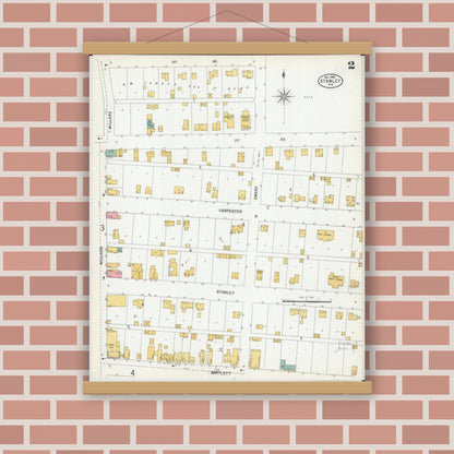 Old map wall art mockup — magnetic wood frame on brick wall — Sanborn Fire Insurance Map from Stanley, Chippewa County, Wisconsin (1900), Sheet #0002