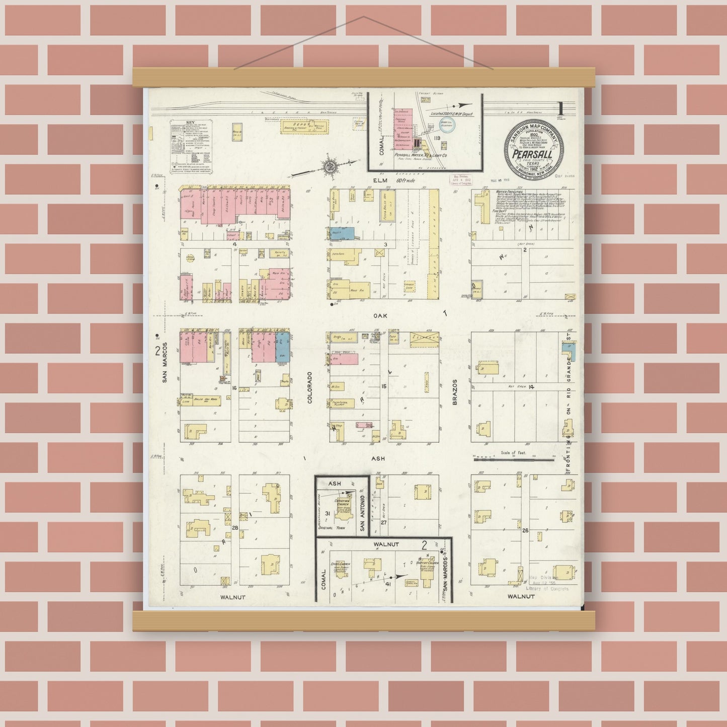 Old map wall art mockup — magnetic wood frame on brick wall — Sanborn Fire Insurance Map from Pearsall, Frio County, Texas (1912) - Complete Map Set
