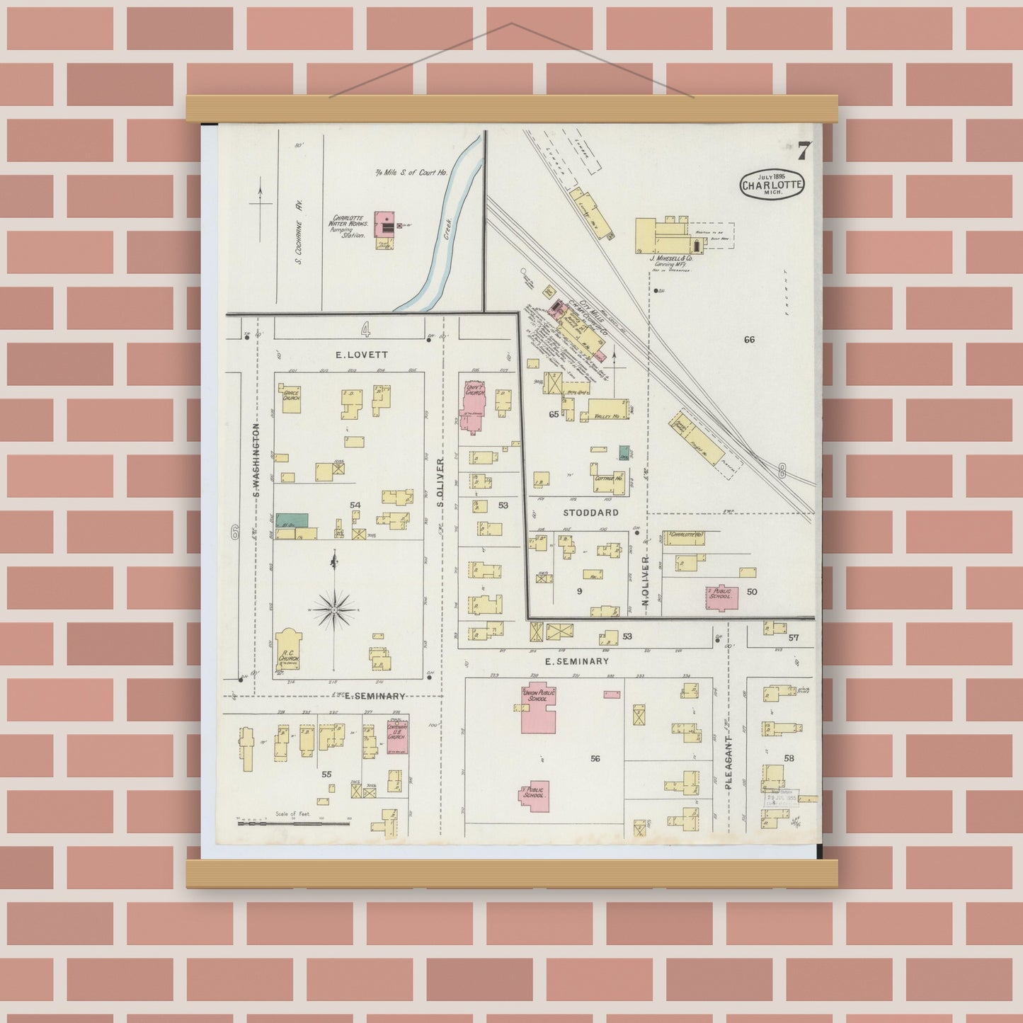 Old map wall art mockup — magnetic wood frame on brick wall — Sanborn Fire Insurance Map from Charlotte, Eaton County, Michigan (1895), Sheet #0007