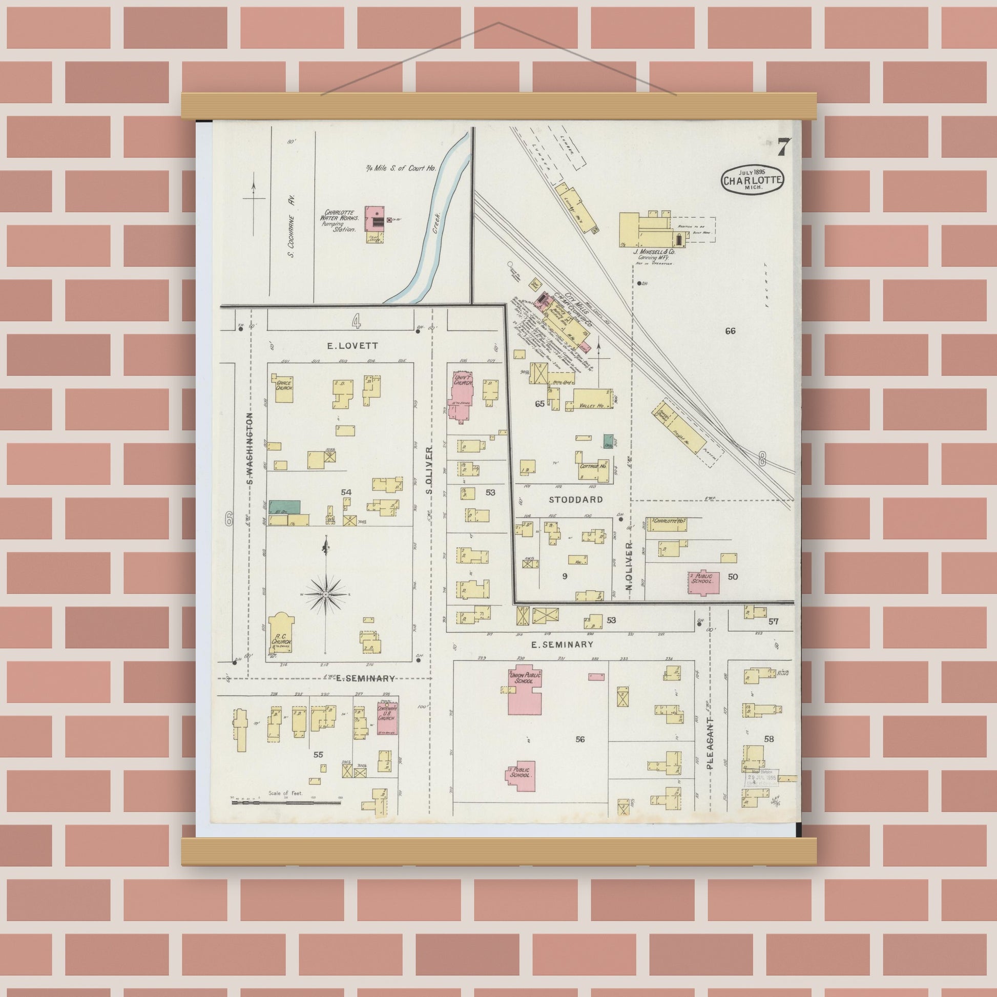 Old map wall art mockup — magnetic wood frame on brick wall — Sanborn Fire Insurance Map from Charlotte, Eaton County, Michigan (1895), Sheet #0007