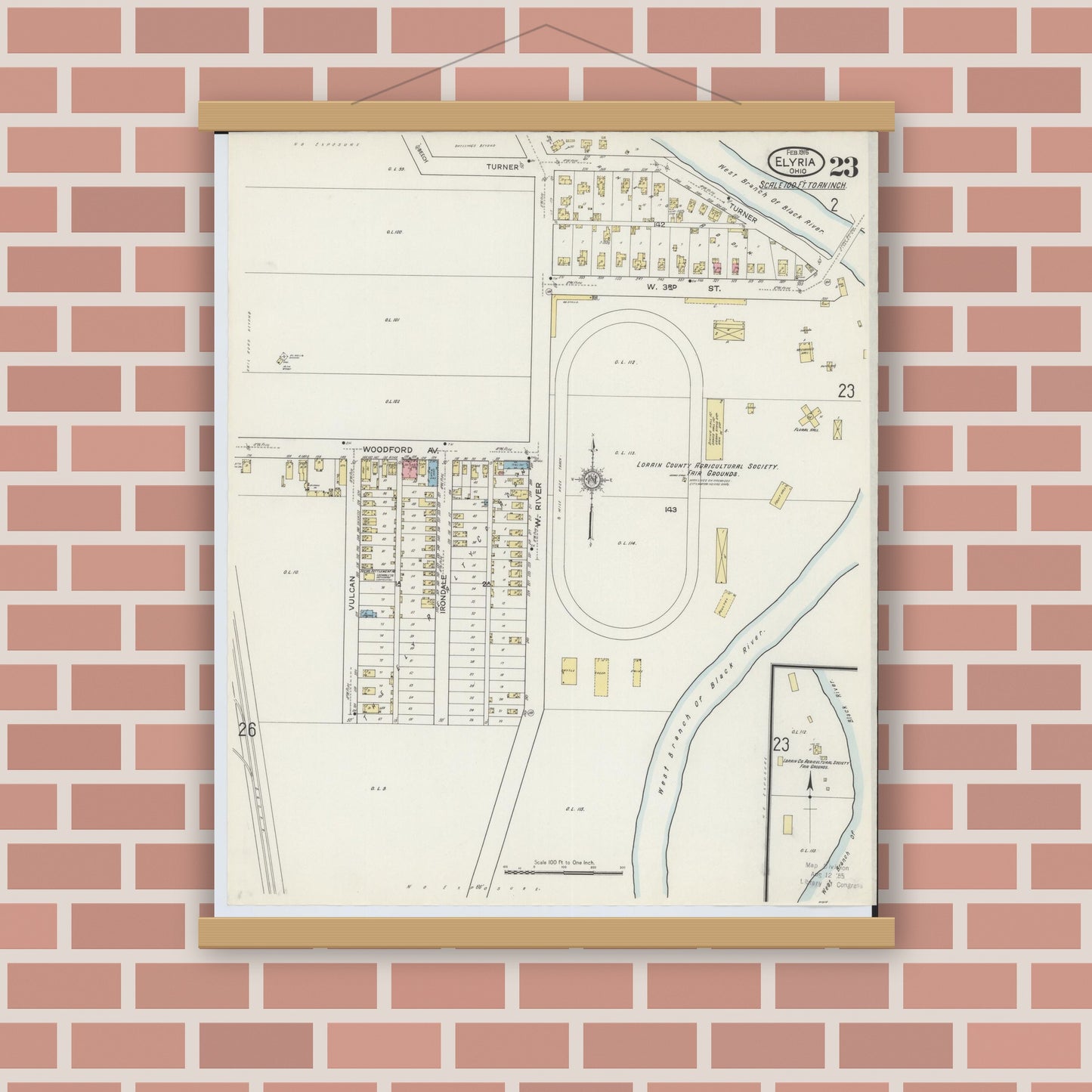 Old map wall art mockup — magnetic wood frame on brick wall — Sanborn Fire Insurance Map from Elyria, Lorain County, Ohio (1915), Sheet #0023