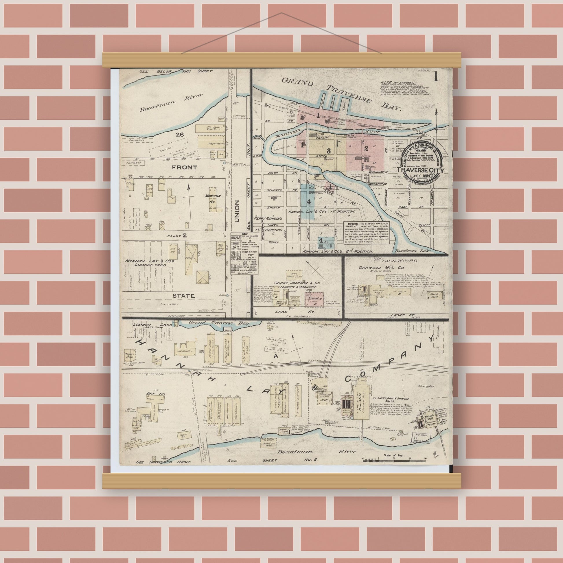 Old map wall art mockup — magnetic wood frame on brick wall — Sanborn Fire Insurance Map from Traverse City, Grand Traverse County, Michigan (1884) - Complete Map Set