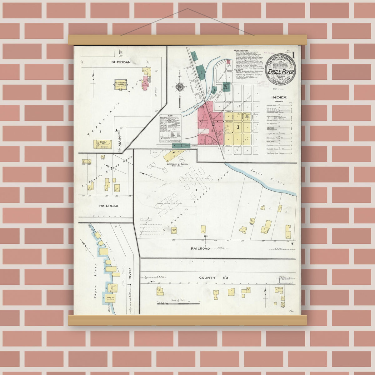 Old map wall art mockup — magnetic wood frame on brick wall — Sanborn Fire Insurance Map from Eagle River, Vilas County, Wisconsin (1909), Sheet #0001