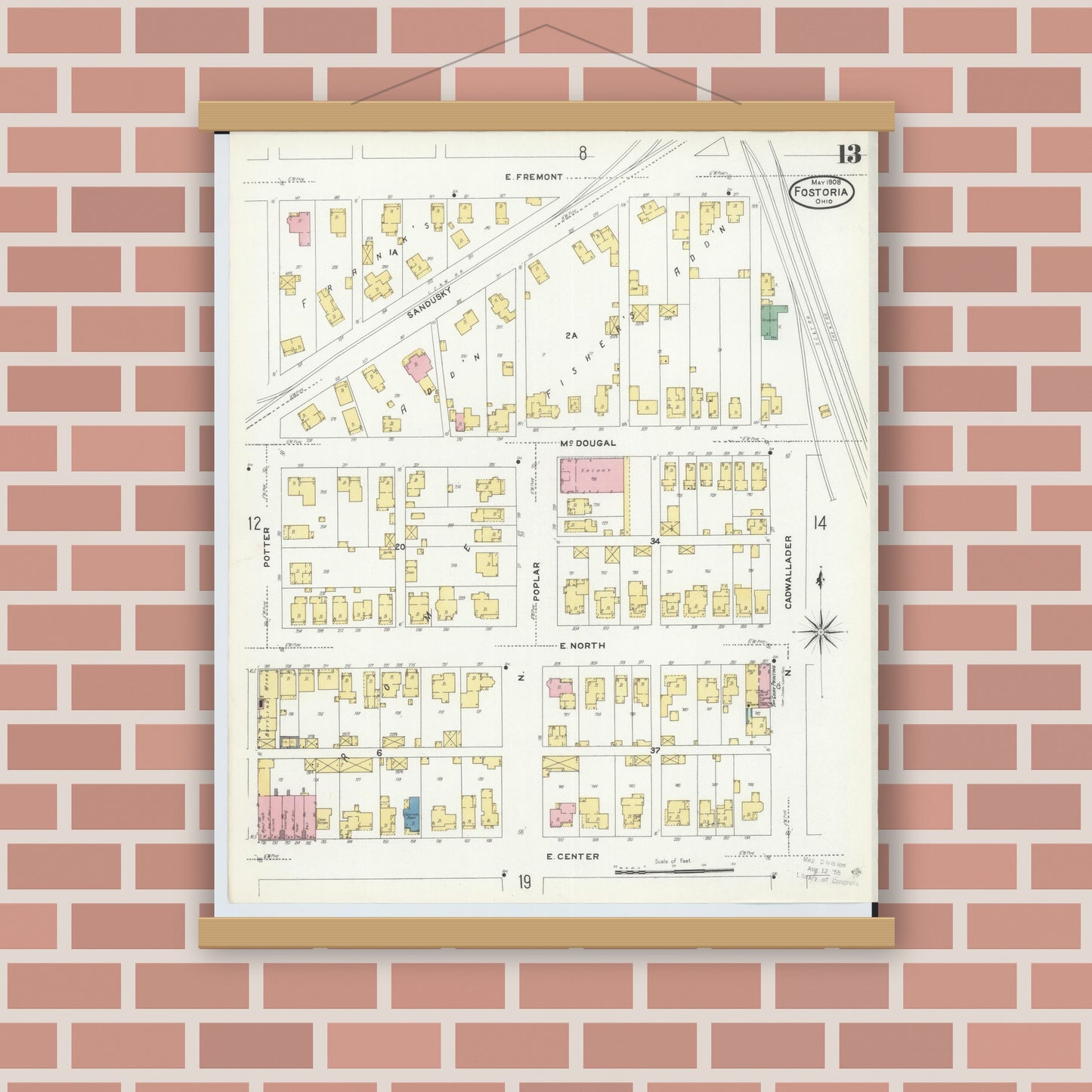 Old map wall art mockup — magnetic wood frame on brick wall — Sanborn Fire Insurance Map from Fostoria, Seneca, Hancock, And Wood Counties, Ohio (1908), Sheet #0013