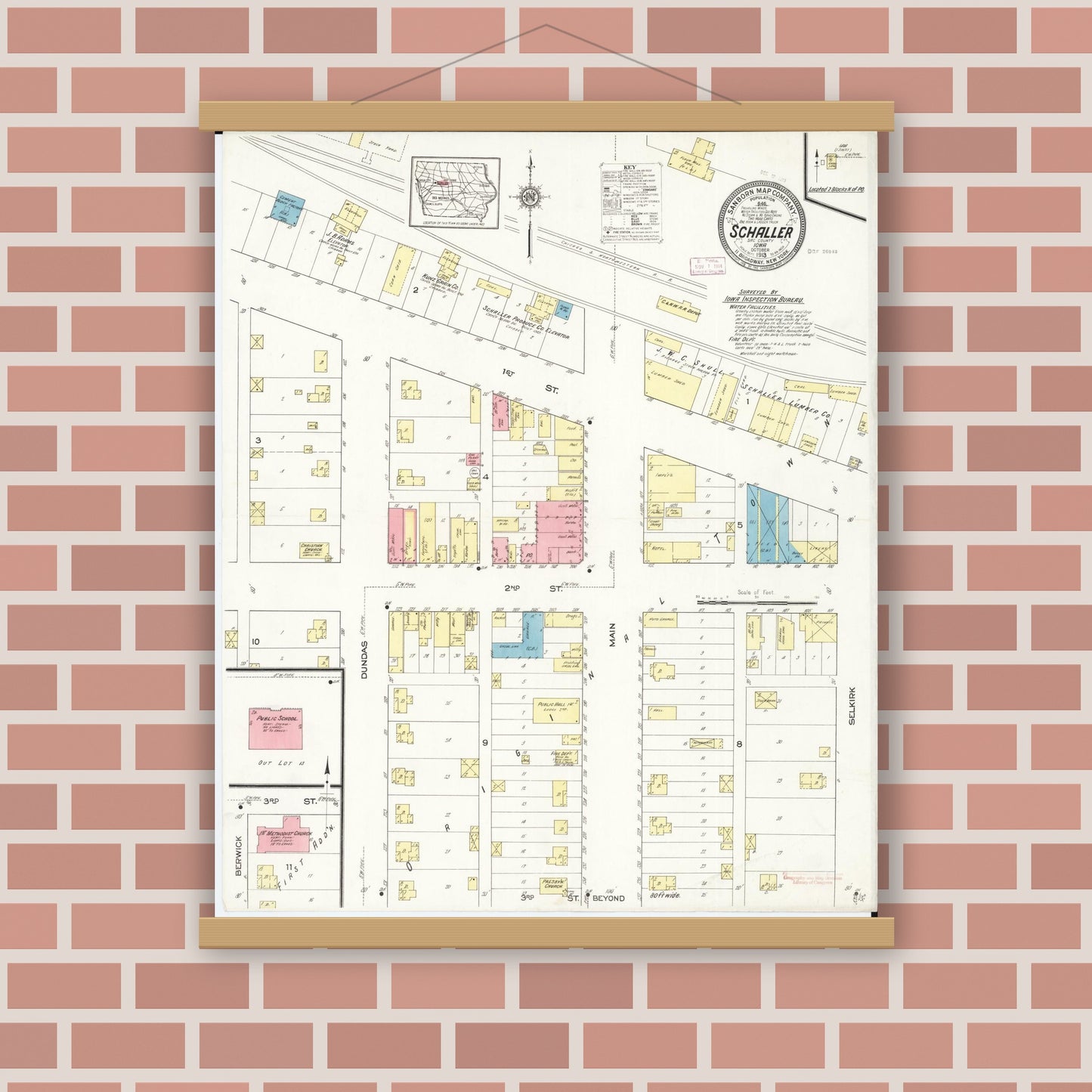 Old map wall art mockup — magnetic wood frame on brick wall — Sanborn Fire Insurance Map from Schaller, Sac County, Iowa (1913), Sheet #0001