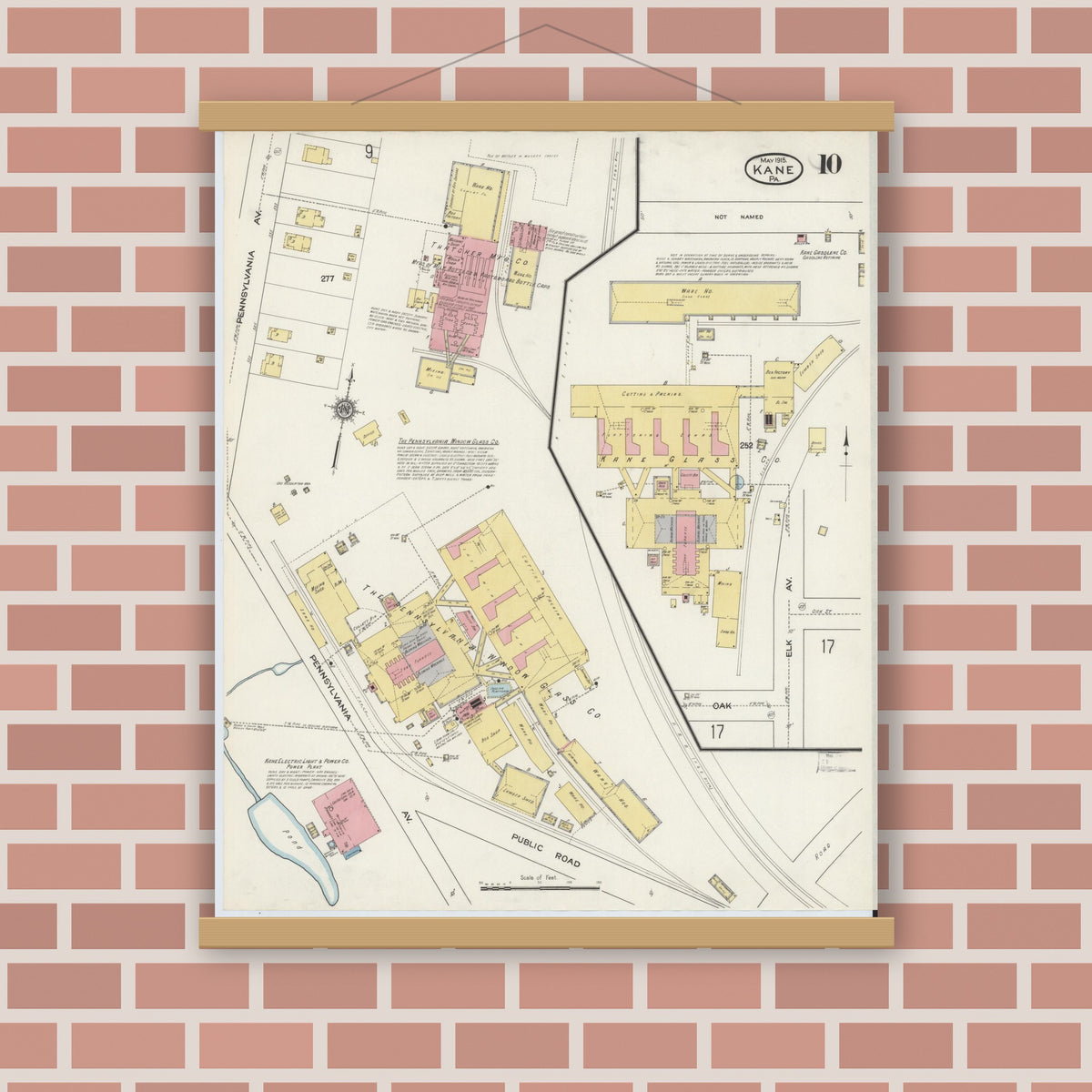 Old map wall art mockup — magnetic wood frame on brick wall — Sanborn Fire Insurance Map from Kane, McKean County, Pennsylvania (1915), Sheet #0010