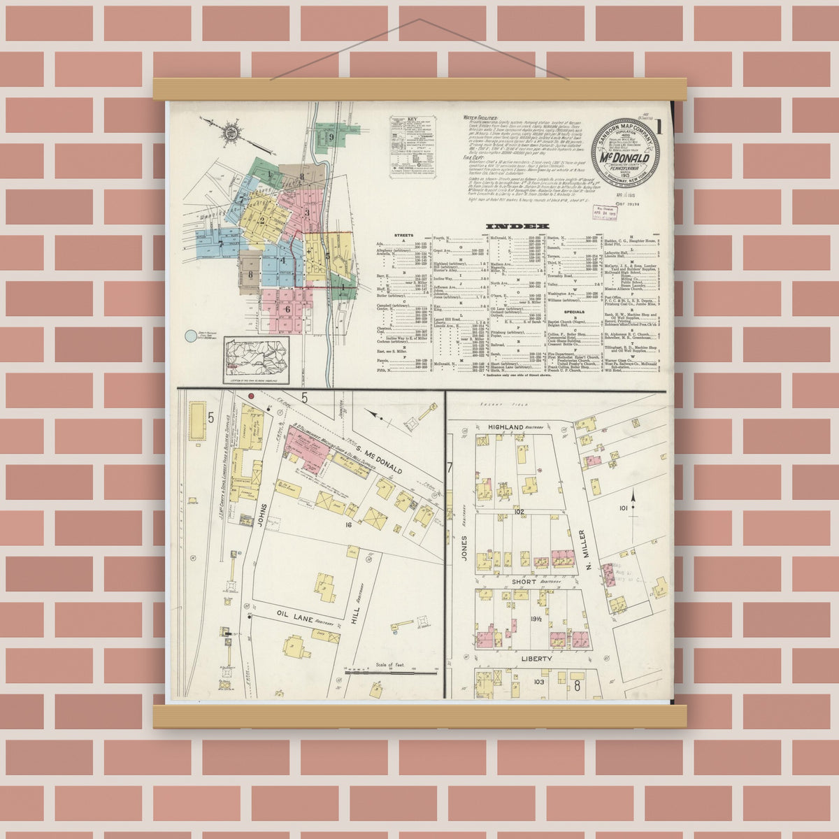 Old map wall art mockup — magnetic wood frame on brick wall — Sanborn Fire Insurance Map from McDonald, Washington County, Pennsylvania (1915), Sheet #0001