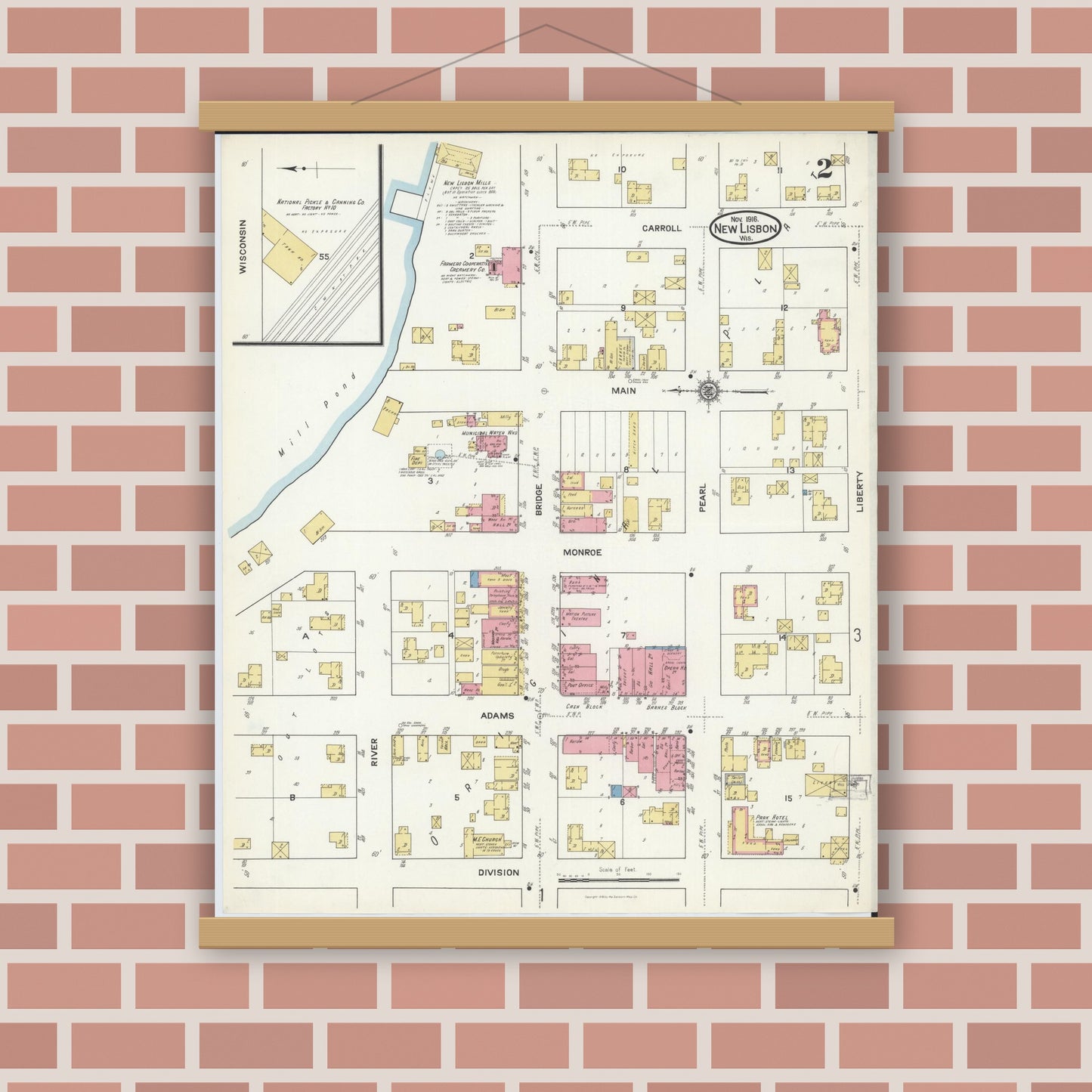 Old map wall art mockup — magnetic wood frame on brick wall — Sanborn Fire Insurance Map from New Lisbon, Juneau County, Wisconsin (1916), Sheet #0002