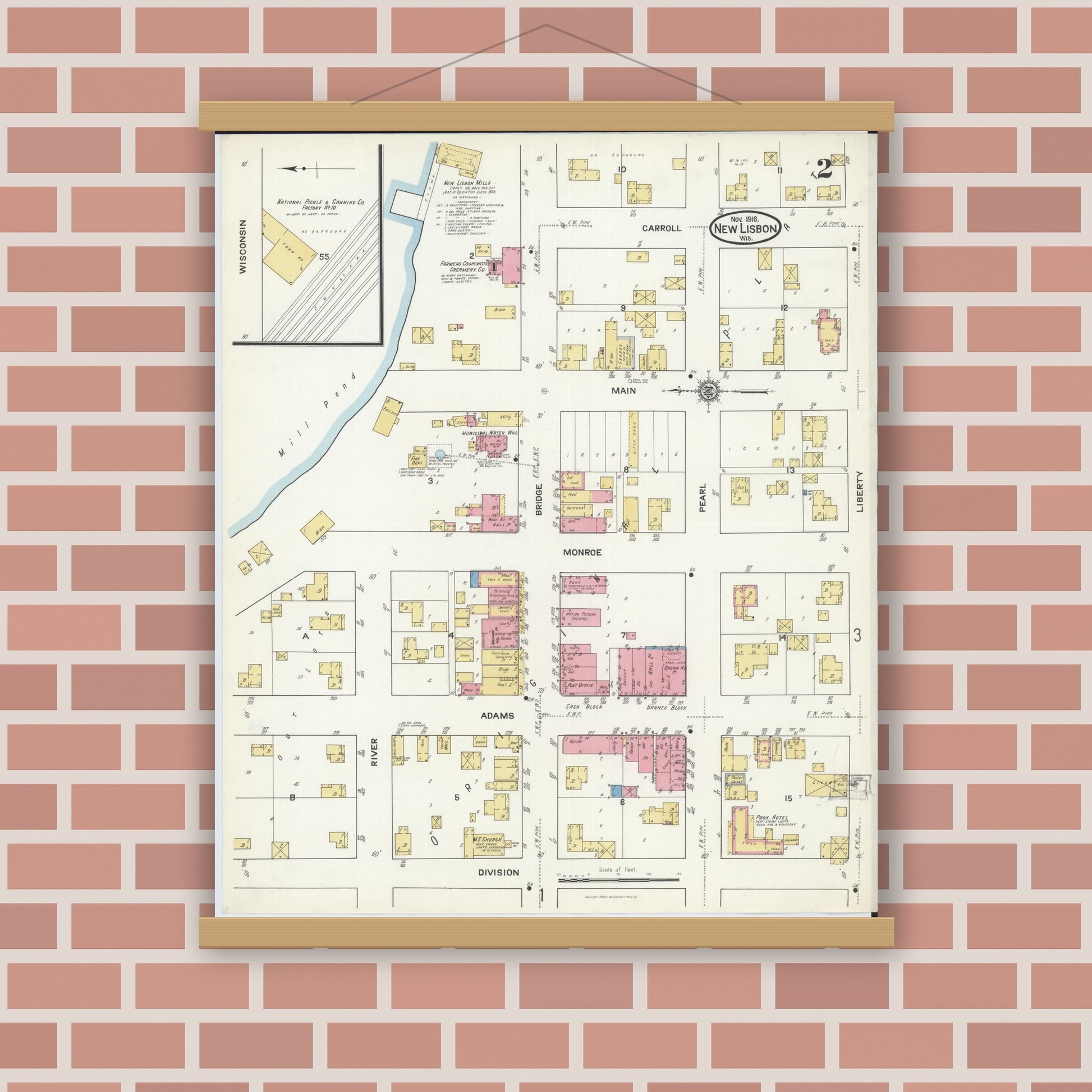 Old map wall art mockup — magnetic wood frame on brick wall — Sanborn Fire Insurance Map from New Lisbon, Juneau County, Wisconsin (1916), Sheet #0002