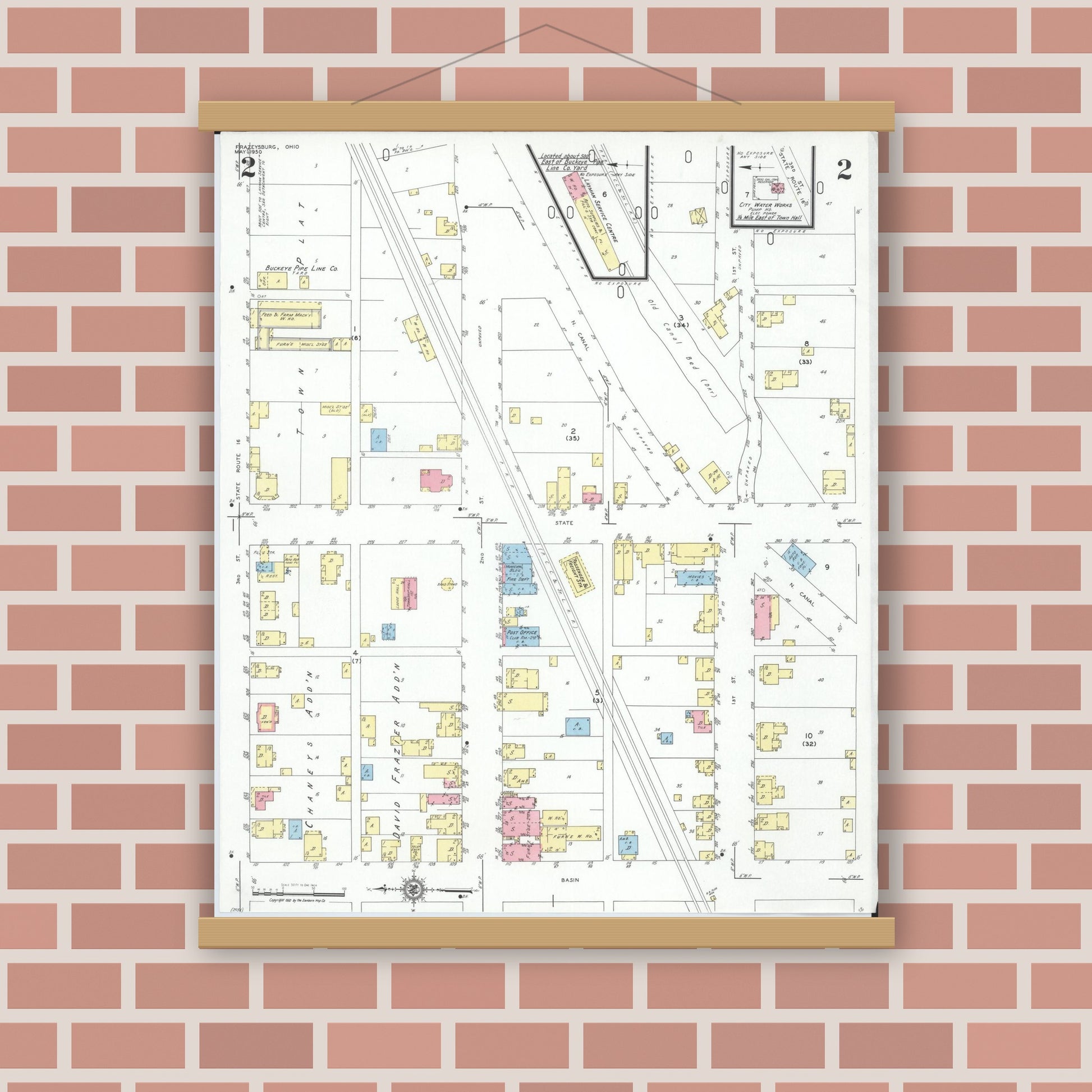 Old map wall art mockup — magnetic wood frame on brick wall — Sanborn Fire Insurance Map from Frazeysburg, Muskingum County, Ohio (1950), Sheet #0002