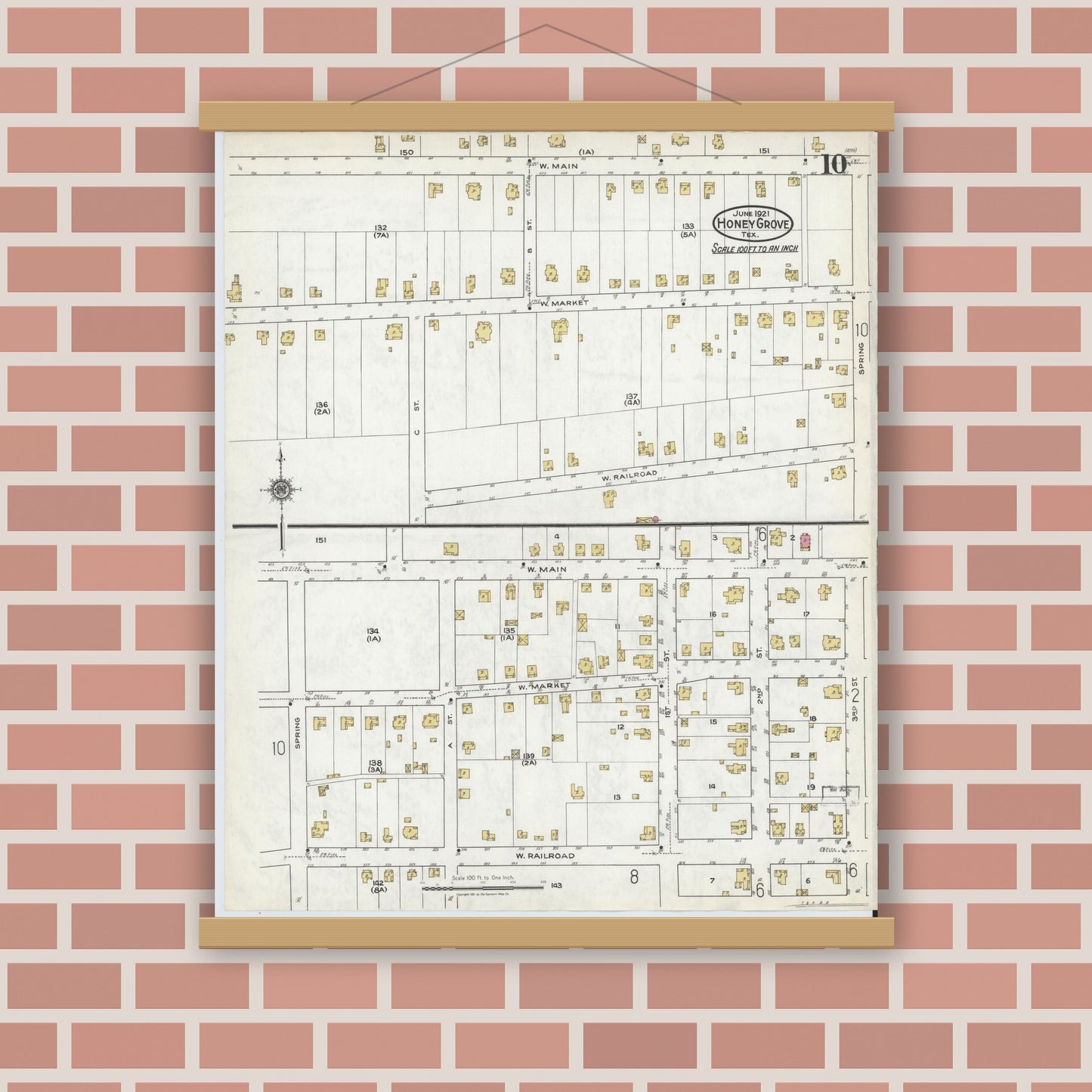 Old map wall art mockup — magnetic wood frame on brick wall — Sanborn Fire Insurance Map from Honey Grove, Fannin County, Texas (1921), Sheet #0010