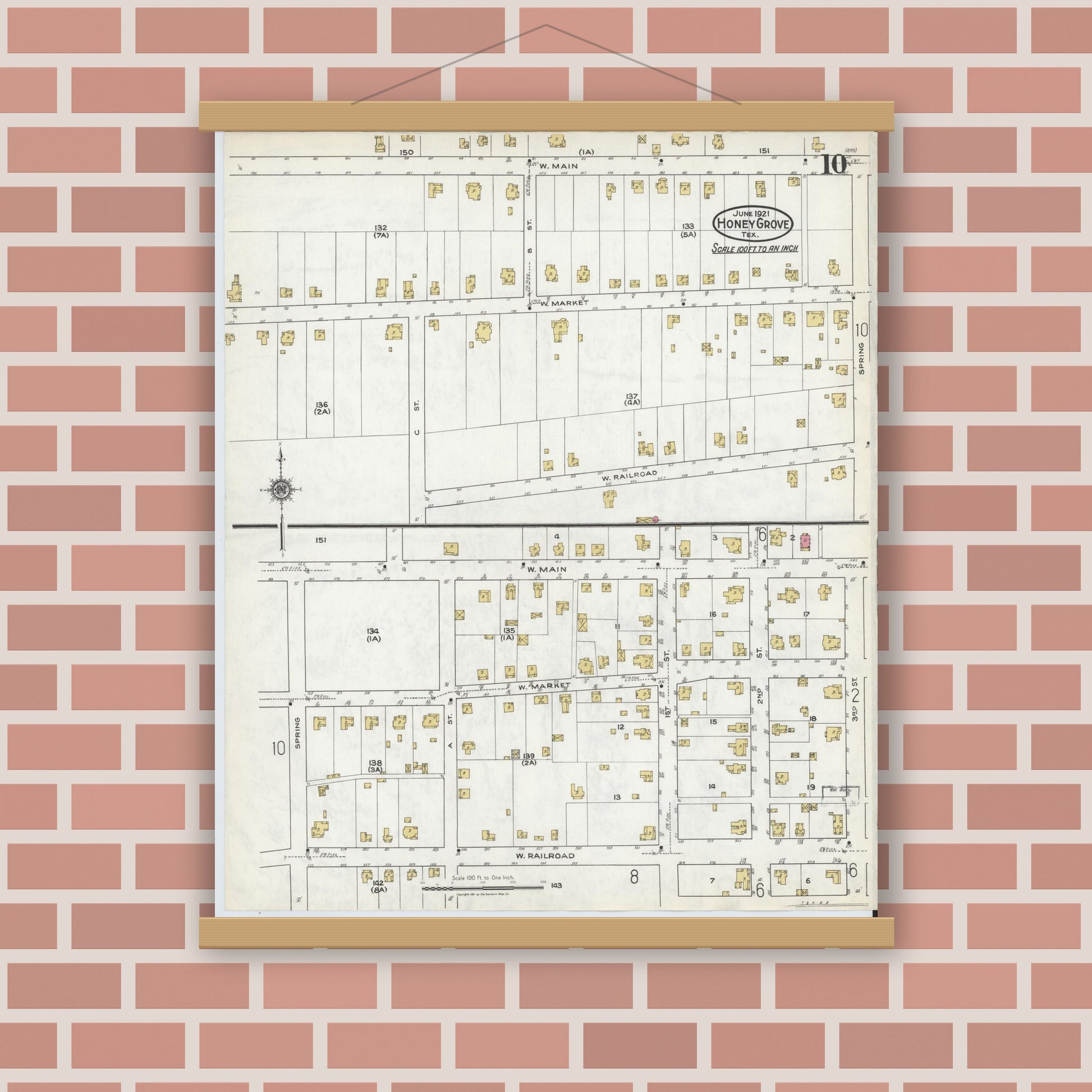 Old map wall art mockup — magnetic wood frame on brick wall — Sanborn Fire Insurance Map from Honey Grove, Fannin County, Texas (1921), Sheet #0010