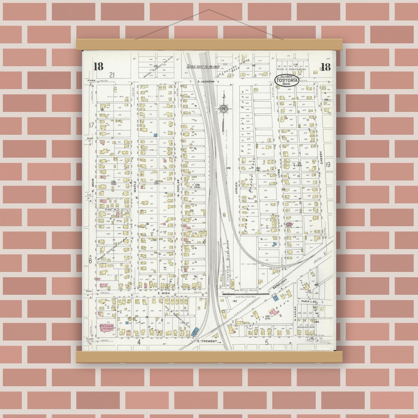 Old map wall art mockup — magnetic wood frame on brick wall — Sanborn Fire Insurance Map from Fostoria, Seneca, Hancock, And Wood Counties, Ohio (1924), Sheet #0018