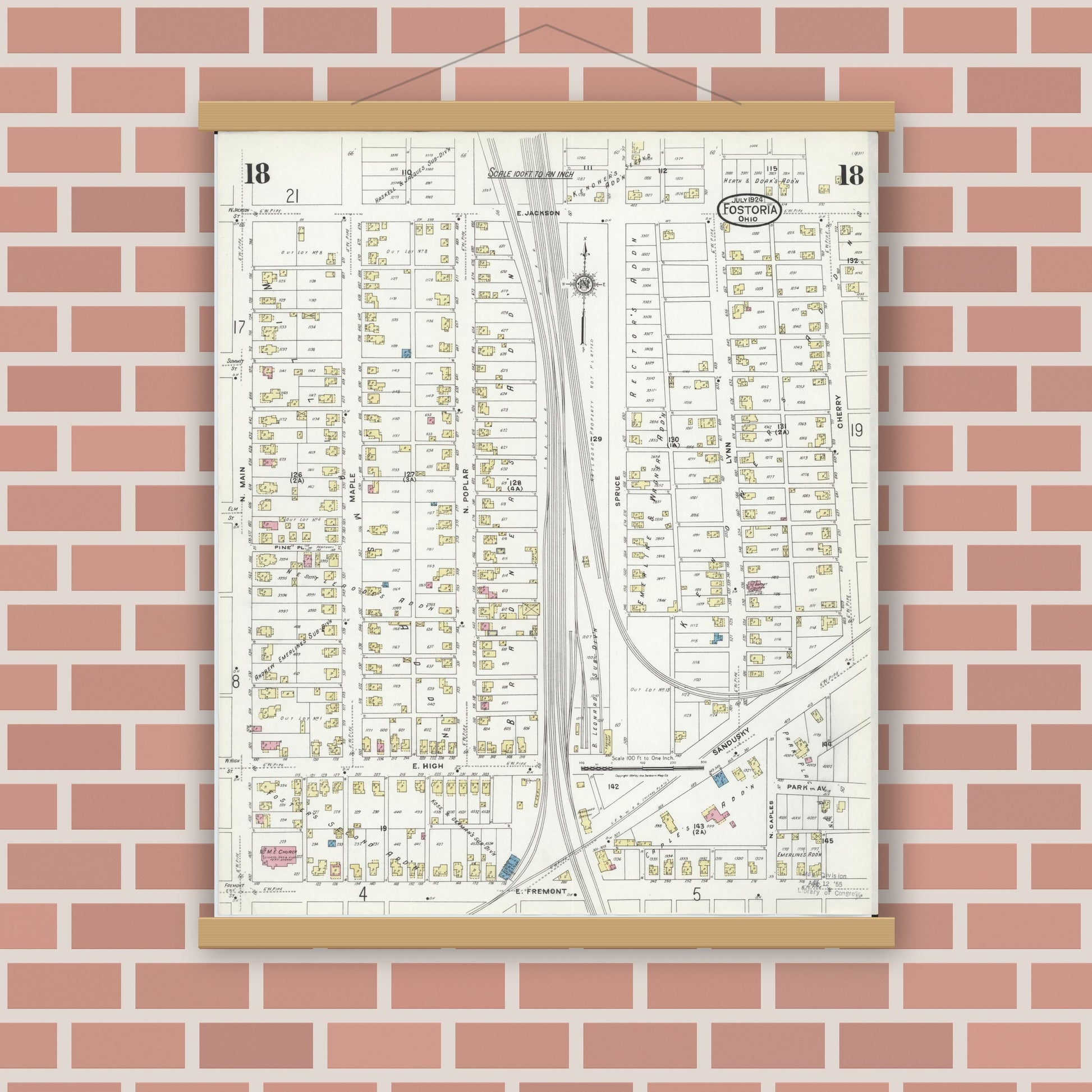 Old map wall art mockup — magnetic wood frame on brick wall — Sanborn Fire Insurance Map from Fostoria, Seneca, Hancock, And Wood Counties, Ohio (1924), Sheet #0018