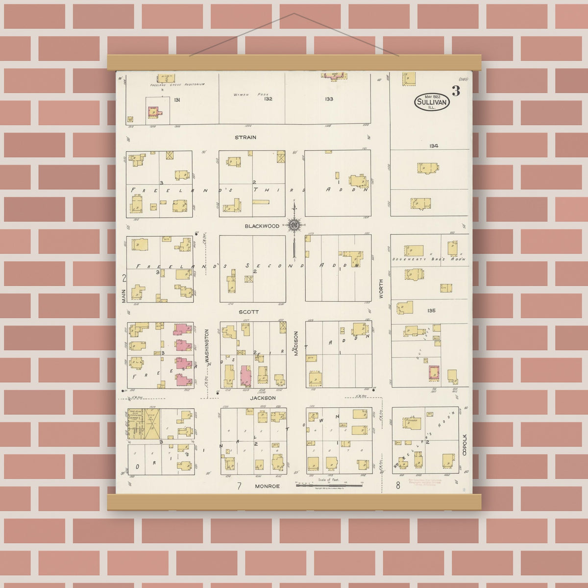 Old map wall art mockup — magnetic wood frame on brick wall — Sanborn Fire Insurance Map from Sullivan, Moultrie County, Illinois (1922), Sheet #0003