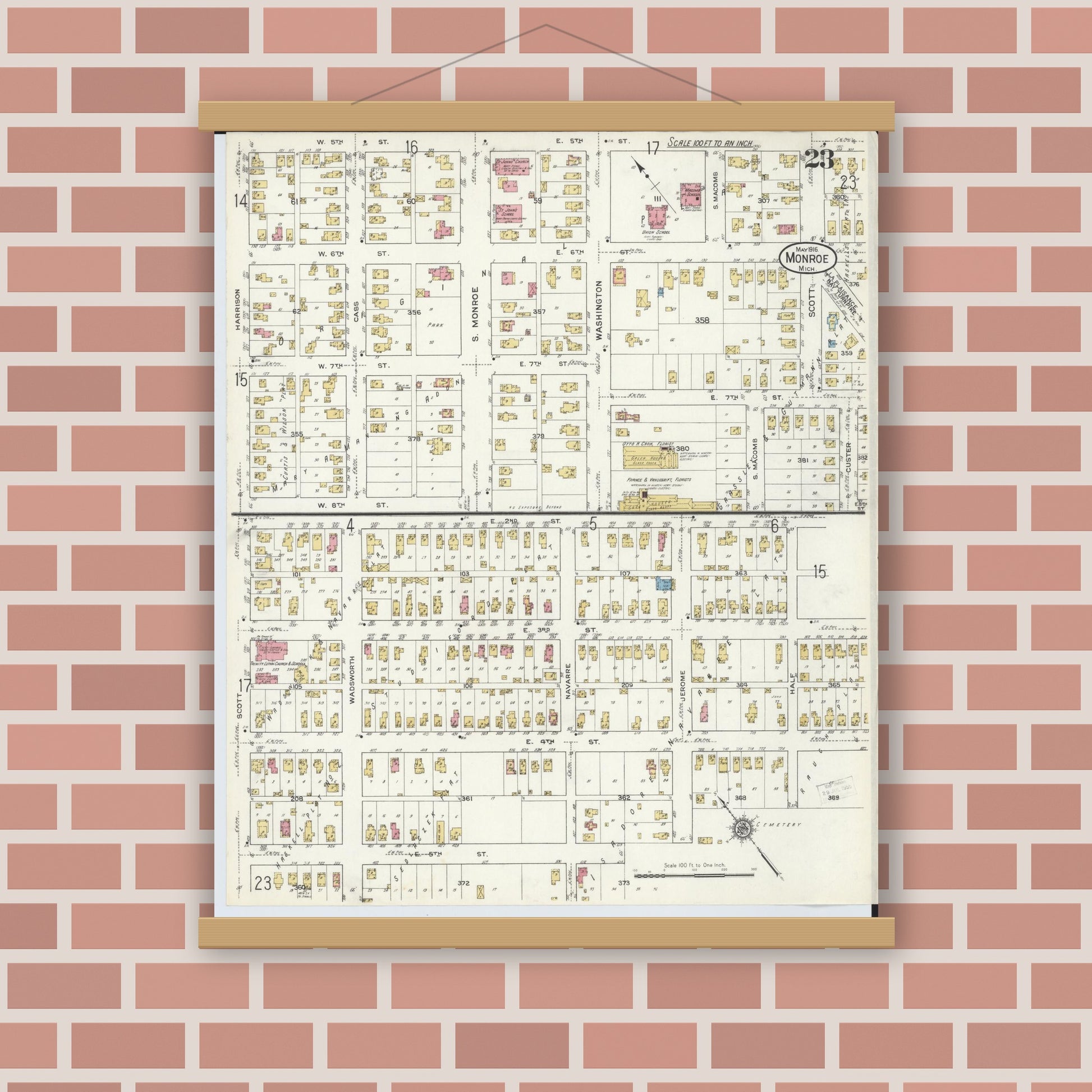 Old map wall art mockup — magnetic wood frame on brick wall — Sanborn Fire Insurance Map from Monroe, Monroe County, Michigan (1916), Sheet #0023
