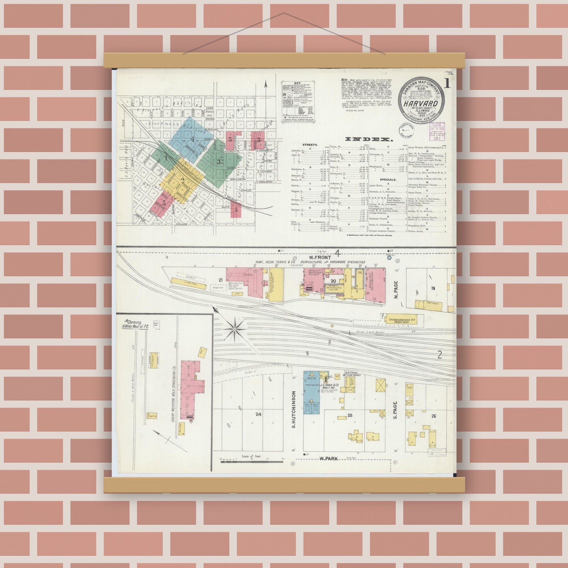 Old map wall art mockup — magnetic wood frame on brick wall — Sanborn Fire Insurance Map from Harvard, McHenry County, Illinois (1902), Sheet #0001