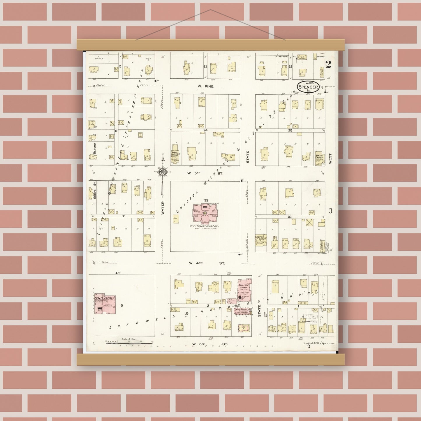 Old map wall art mockup — magnetic wood frame on brick wall — Sanborn Fire Insurance Map from Spencer, Clay County, Iowa (1915), Sheet #0002