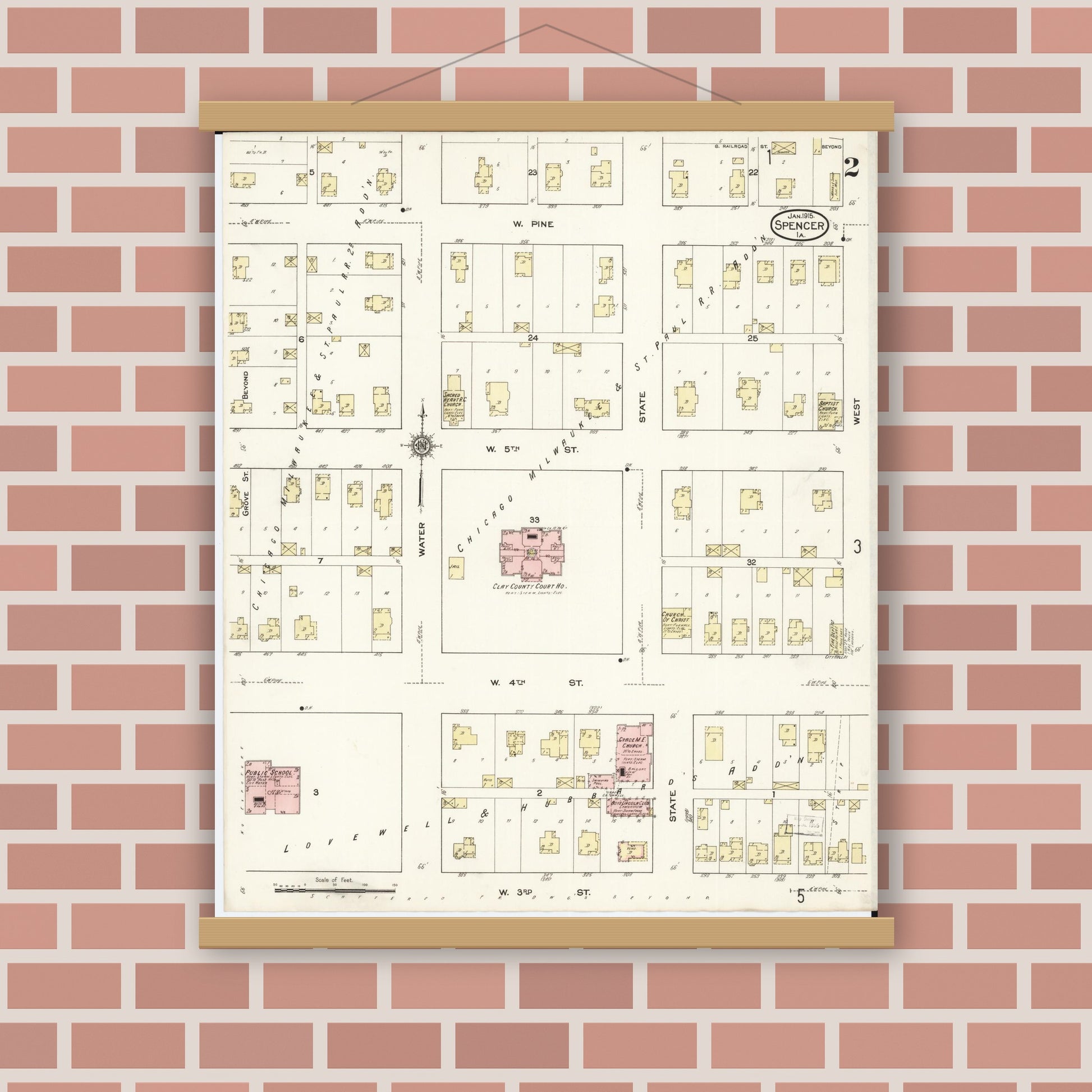 Old map wall art mockup — magnetic wood frame on brick wall — Sanborn Fire Insurance Map from Spencer, Clay County, Iowa (1915), Sheet #0002