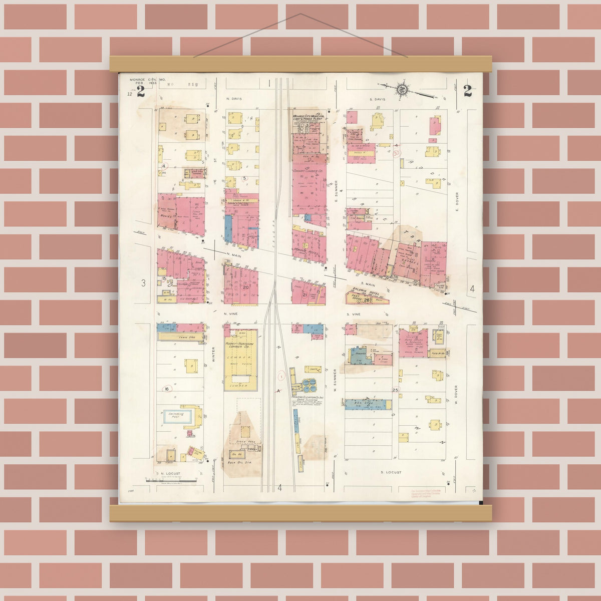 Old map wall art mockup — magnetic wood frame on brick wall — Sanborn Fire Insurance Map from Monroe City, Monroe County, Missouri (1943), Sheet #0002