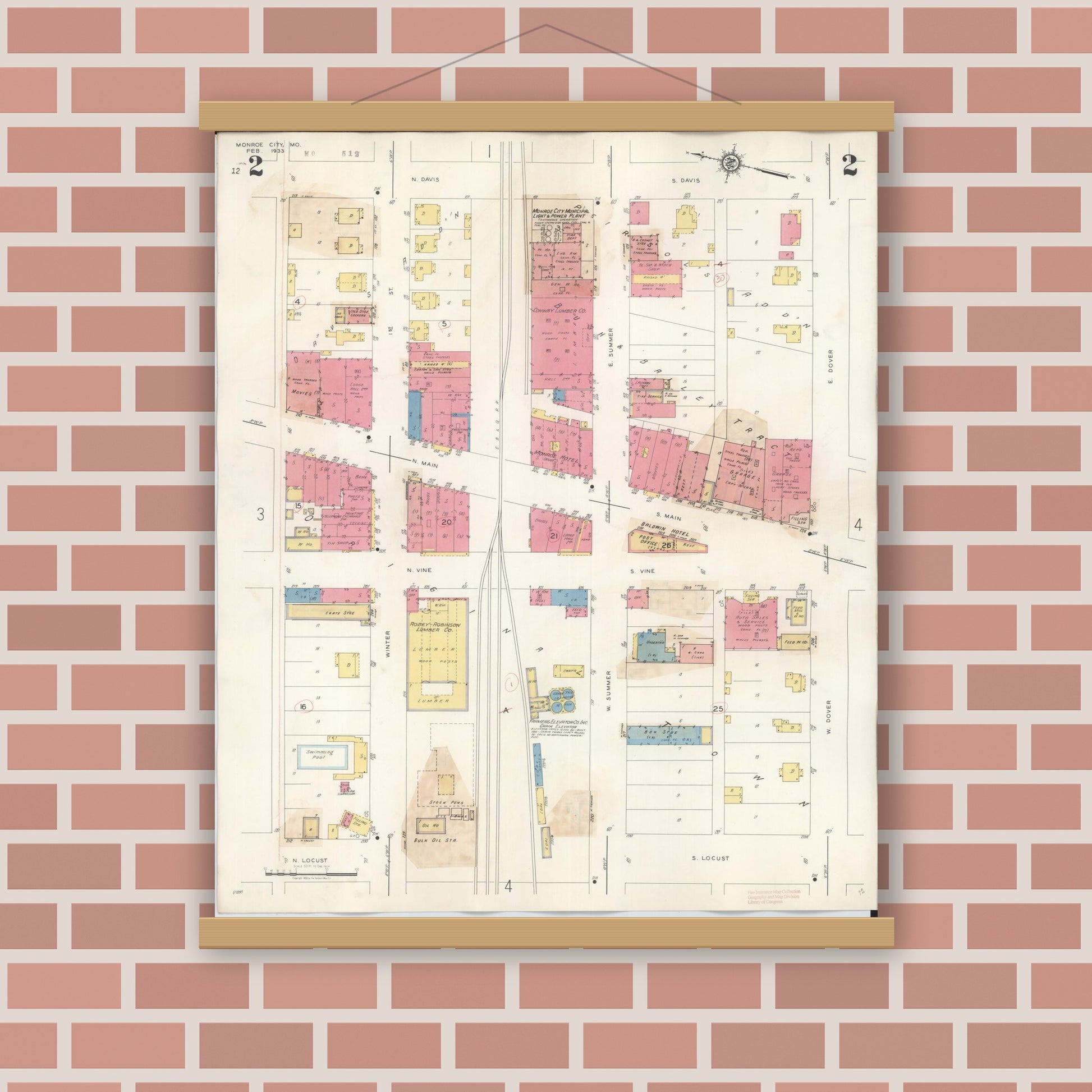 Old map wall art mockup — magnetic wood frame on brick wall — Sanborn Fire Insurance Map from Monroe City, Monroe County, Missouri (1943), Sheet #0002