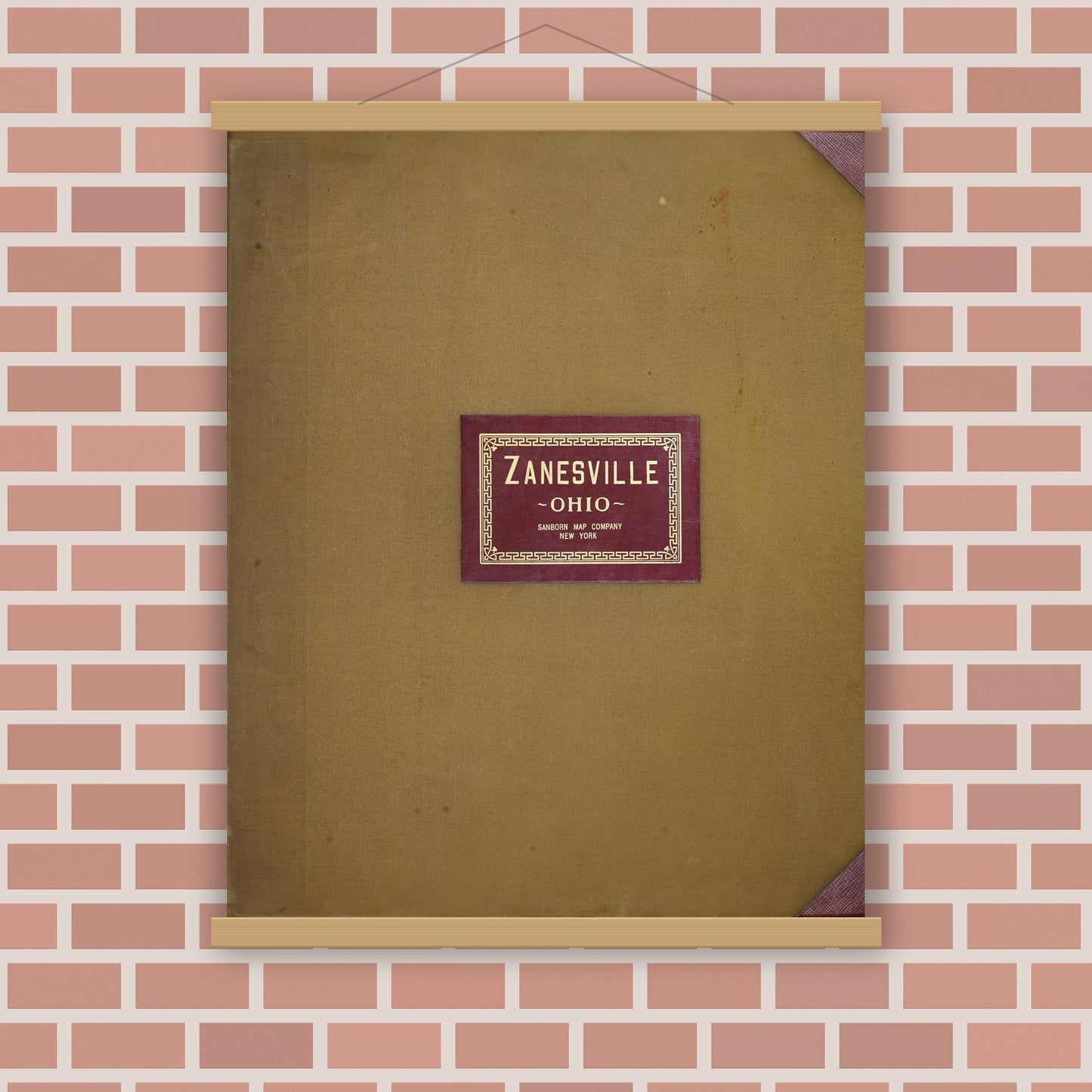 Old map wall art mockup — magnetic wood frame on brick wall — Sanborn Fire Insurance Map from Zanesville, Muskingum County, Ohio (1950), Sheet #0001