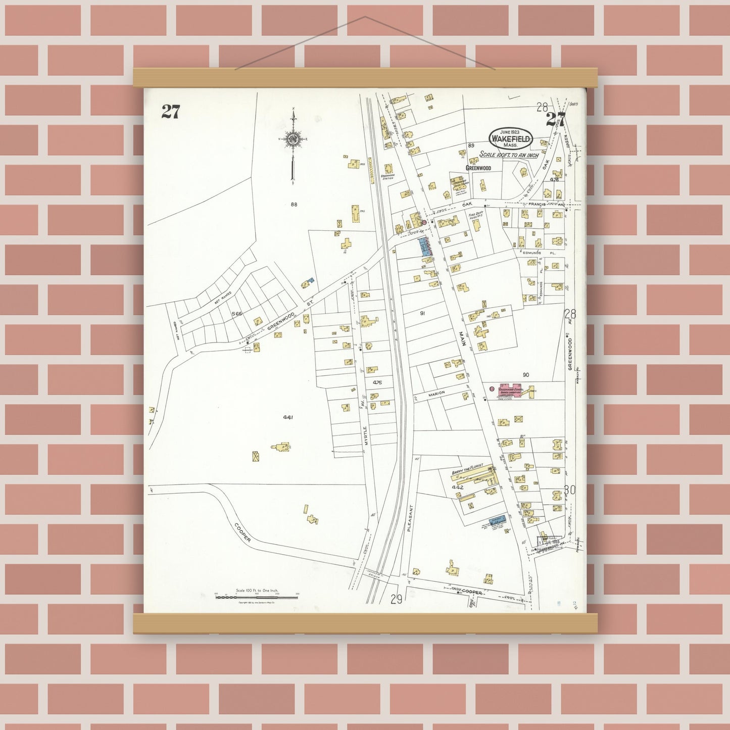 Old map wall art mockup — magnetic wood frame on brick wall — Sanborn Fire Insurance Map from Wakefield, Middlesex County, Massachusetts (1923), Sheet #0027