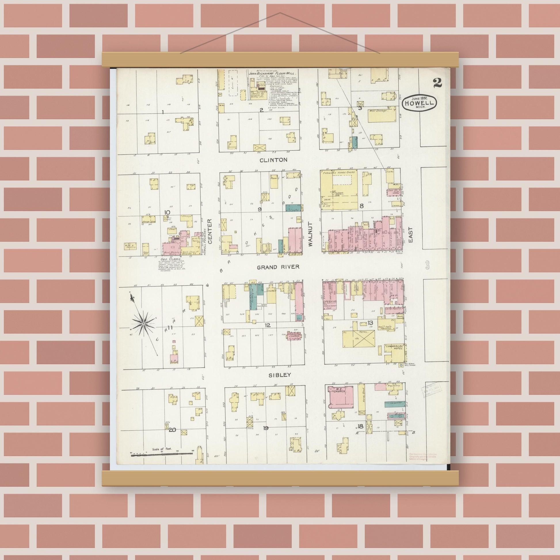 Old map wall art mockup — magnetic wood frame on brick wall — Sanborn Fire Insurance Map from Howell, Livingston County, Michigan (1892), Sheet #0002